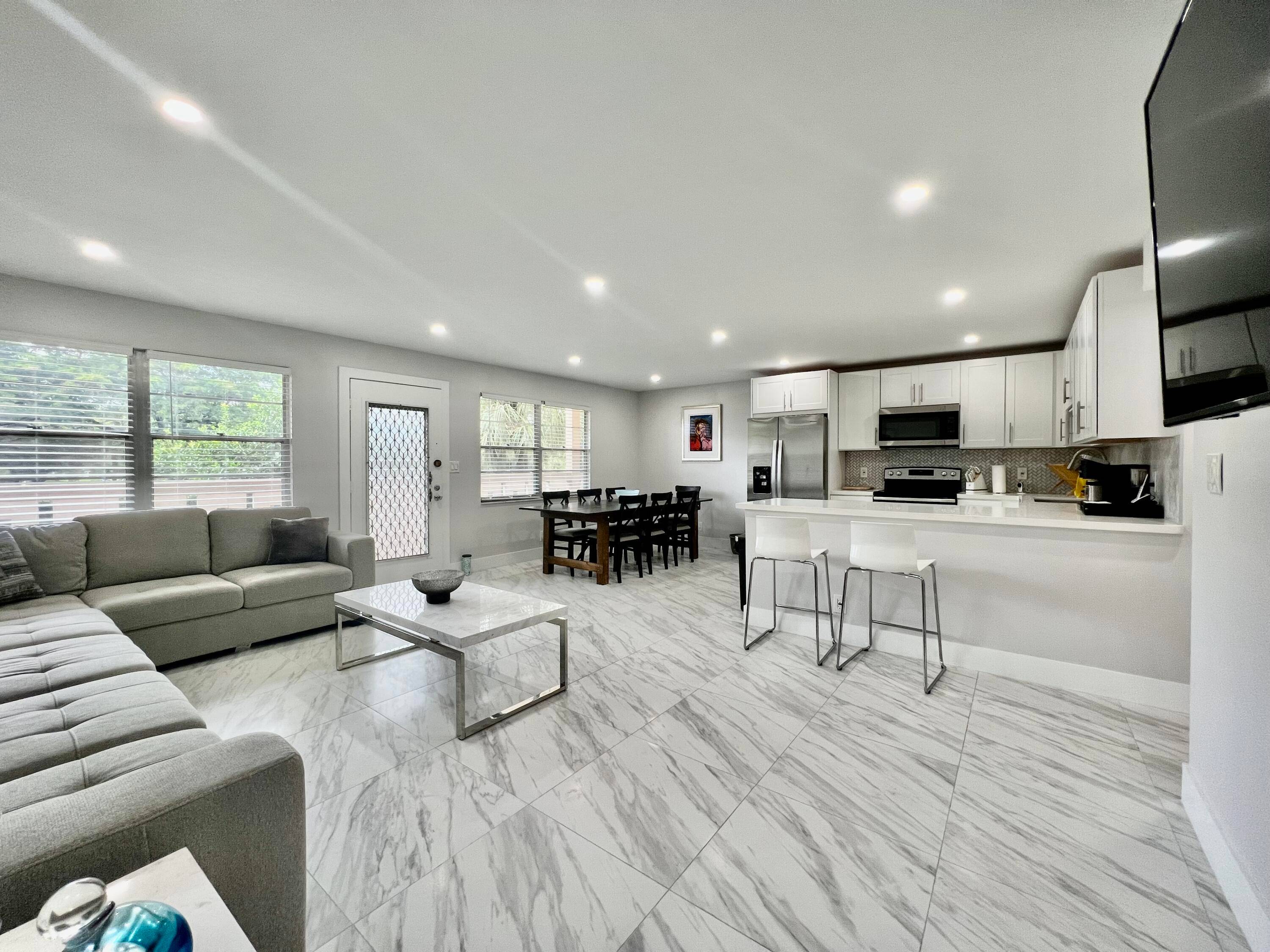 WELCOME HOME TO YOUR 2 2 TURNKEY, COMPLETELY RENOVATED, WATERFRONT CONDO !
