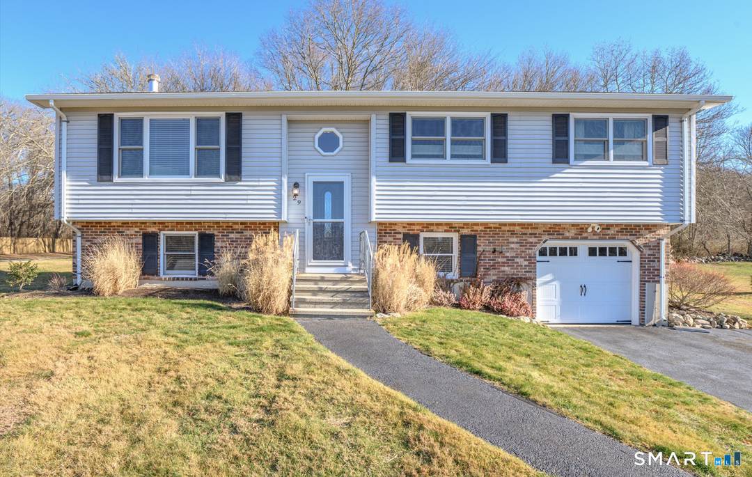 Beautifully updated Raised Ranch rental in a quiet Mystic side Stonington neighborhood set on nearly an acre.