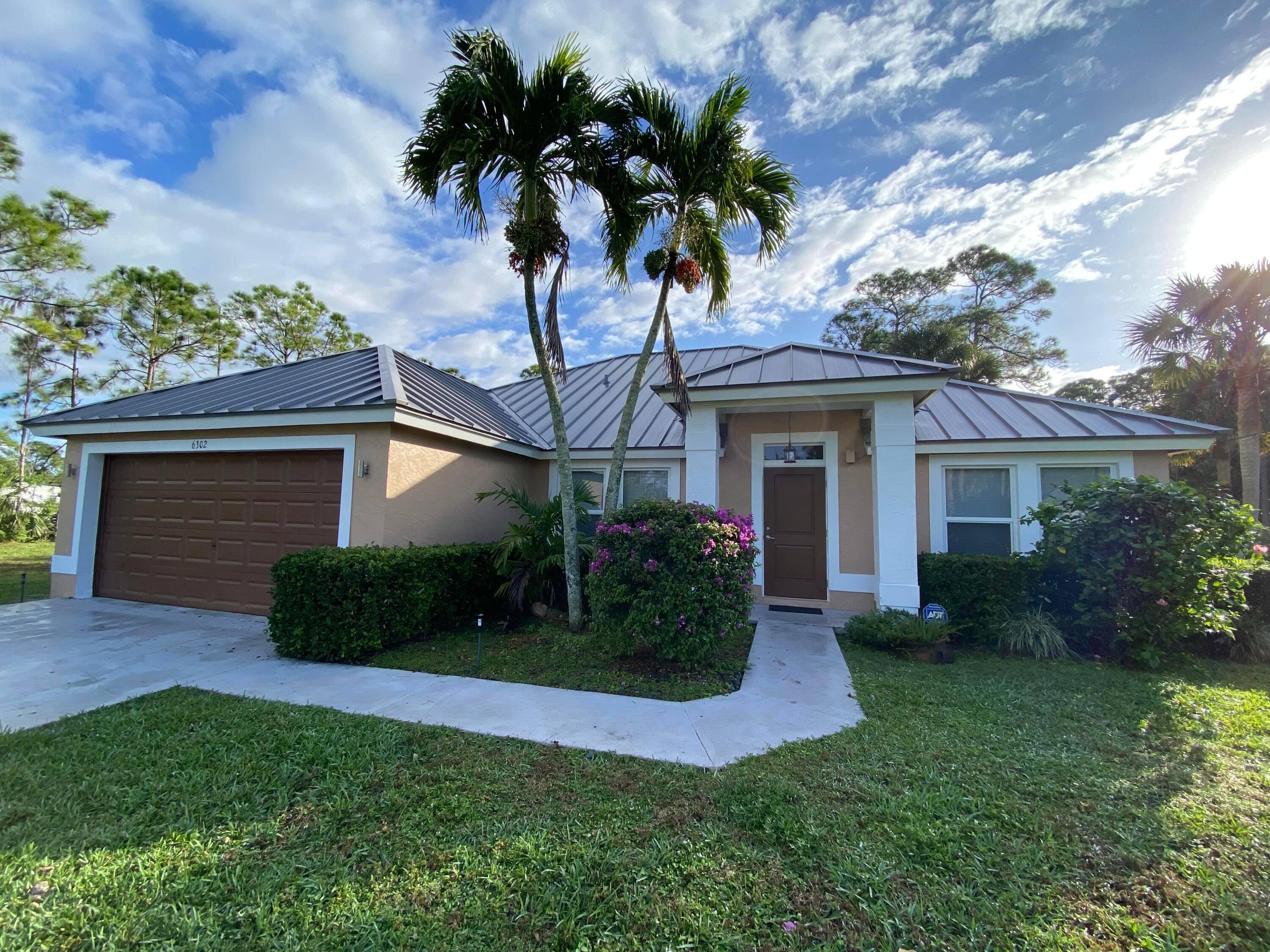 This beautiful home has been well cared for and is located right off of Royal Palm Beach Blvd.