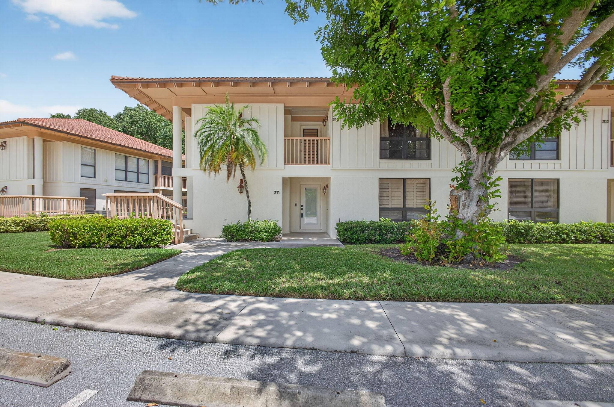 Enjoy effortless living in this beautifully remodeled 2 bedroom, 2 bathroom condo located in the sought after Golf Villas community of PGA National.