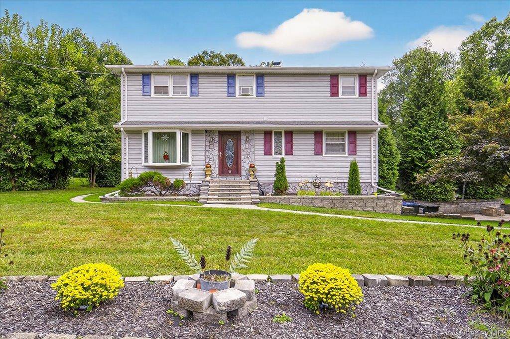 Discover this beautiful colonial in the sought after Merriewold section of the Village of South Blooming Grove.
