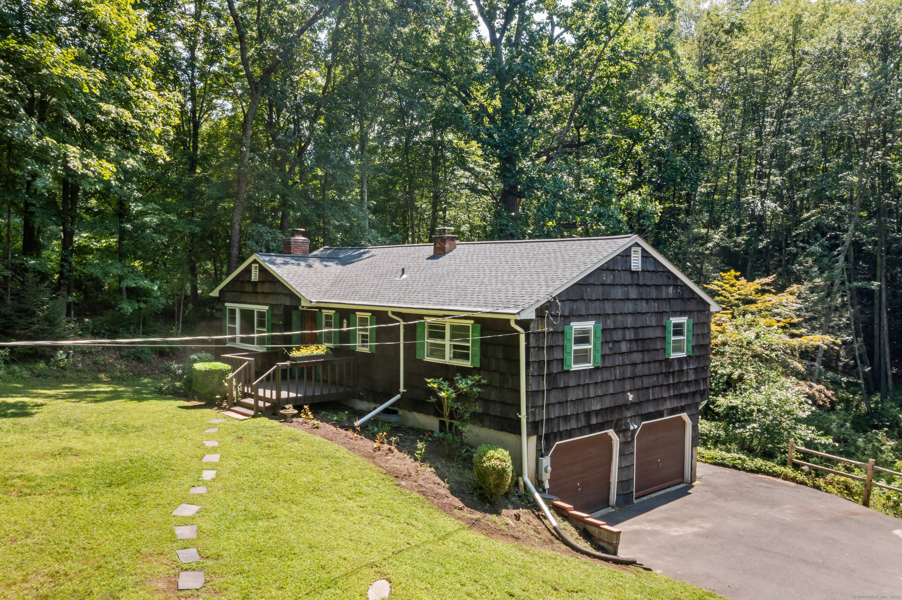 Open and airy 3 bedroom 2 full bath ranch home with central air and 2 car garage.