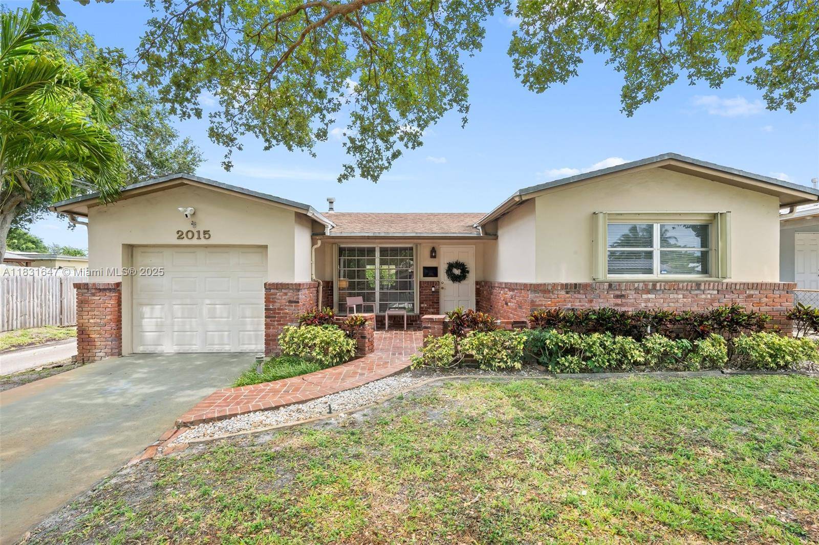 Welcome to this charming and meticulously maintained home at 2015 N 37th Ave in Hollywood Hills !