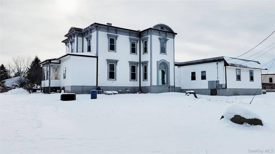 Currently utilized as an agricultural farm camp, this expansive and unconventional property presents an exciting opportunity for a buyer with imagination.