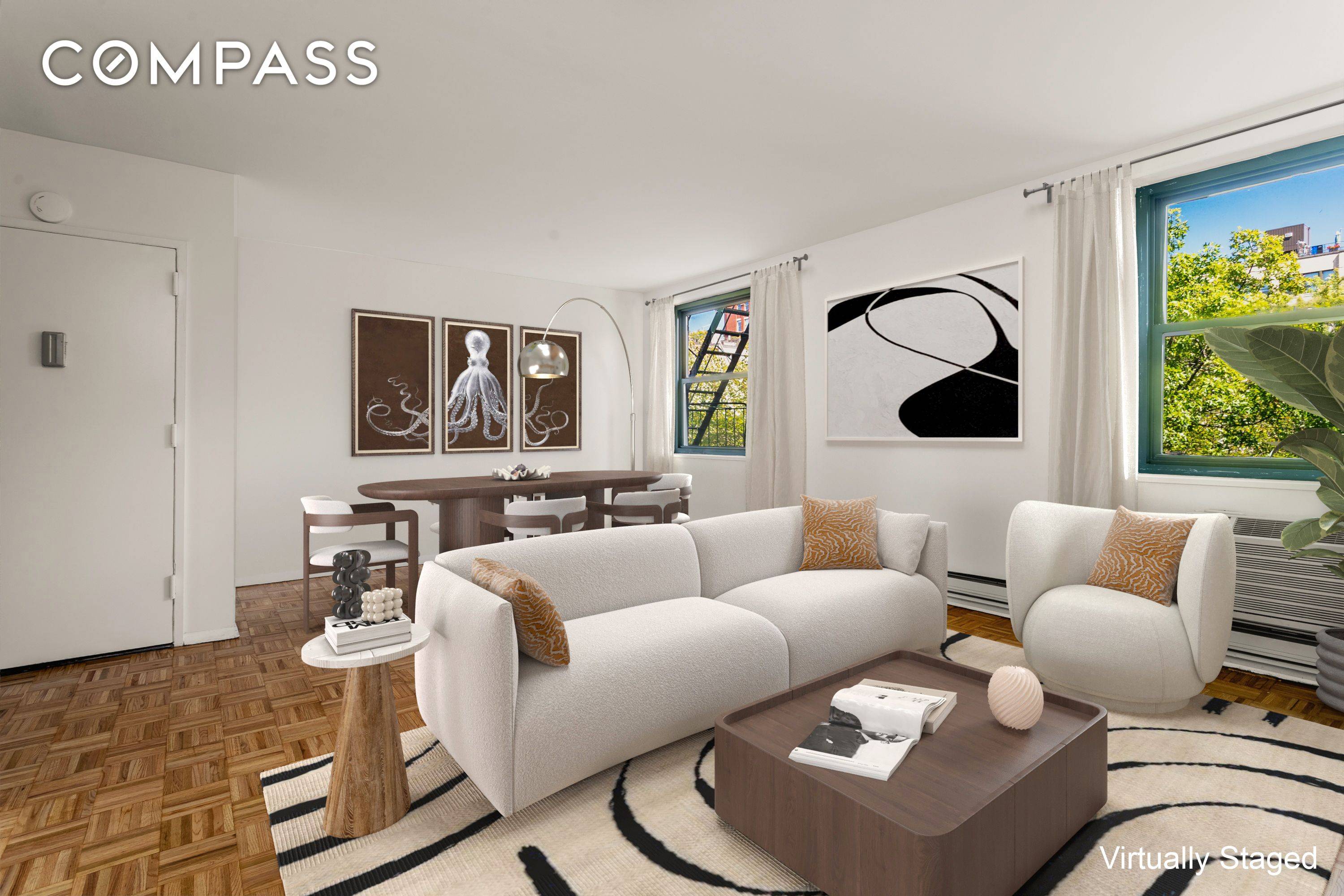 Enjoy golden sunsets over the Hudson River in this light filled floor through home directly across from the Hudson River Park.