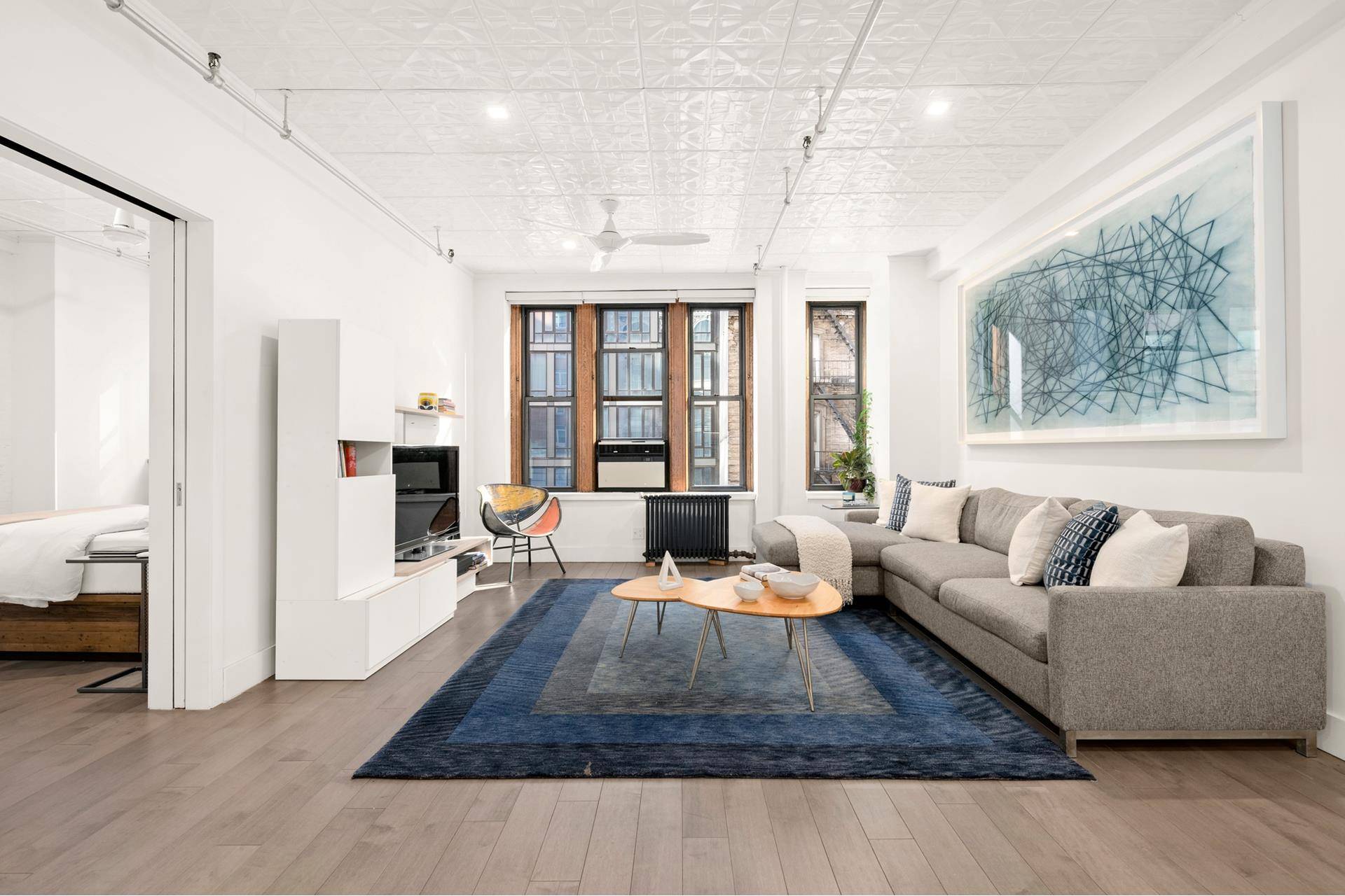 Renovated South Facing 1 Bedroom Loft in the Chelsea Flower District Awash in south sunlight, this stunning one bedroom loft with 9' 2 classic tin ceilings and original prewar details ...