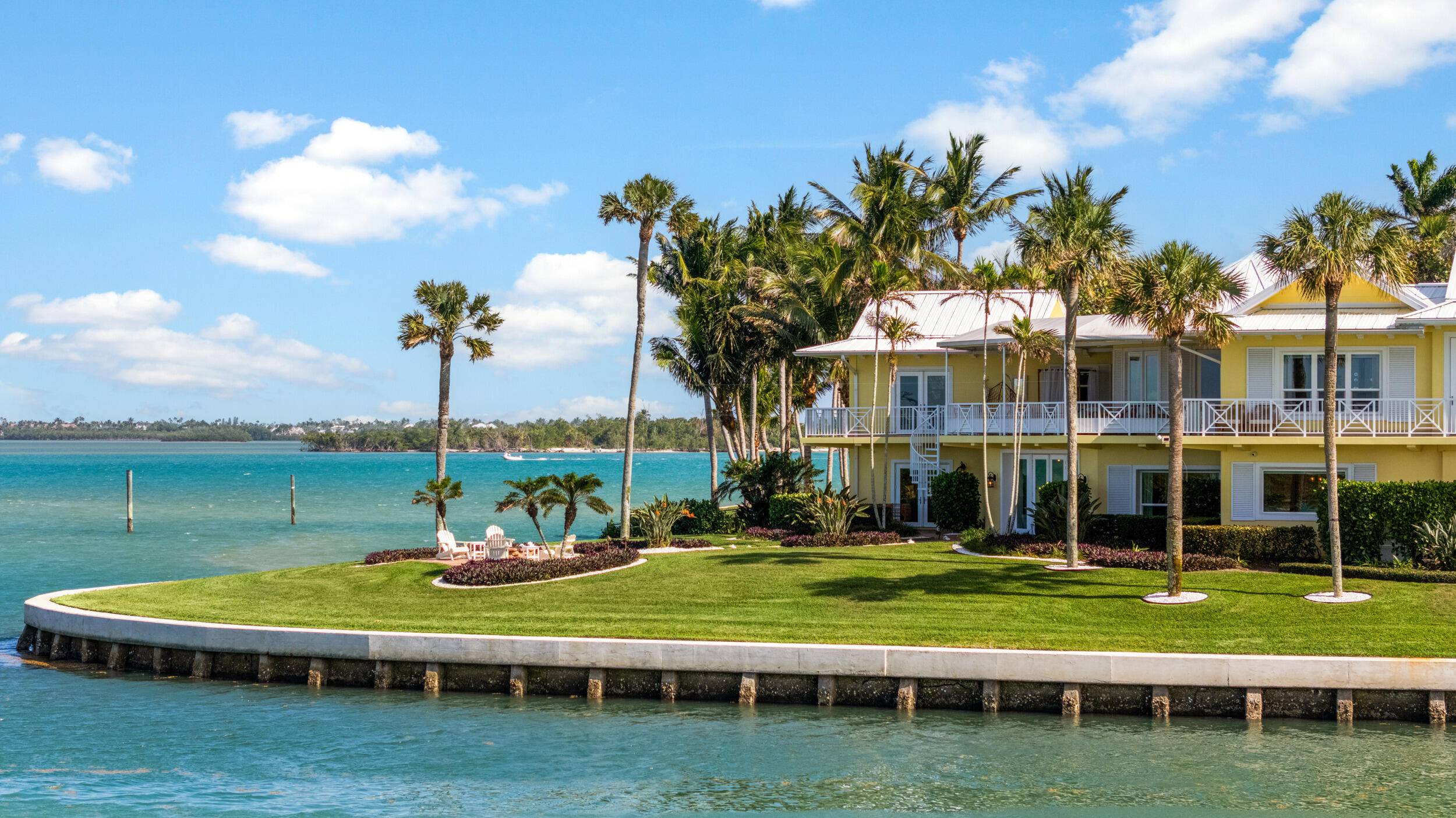 Positioned in the prestigious Archipelago enclave of South Sewall's Point, this estate is a rare find an architectural statement that blends the breezy elegance of Key West with enduring sophistication.