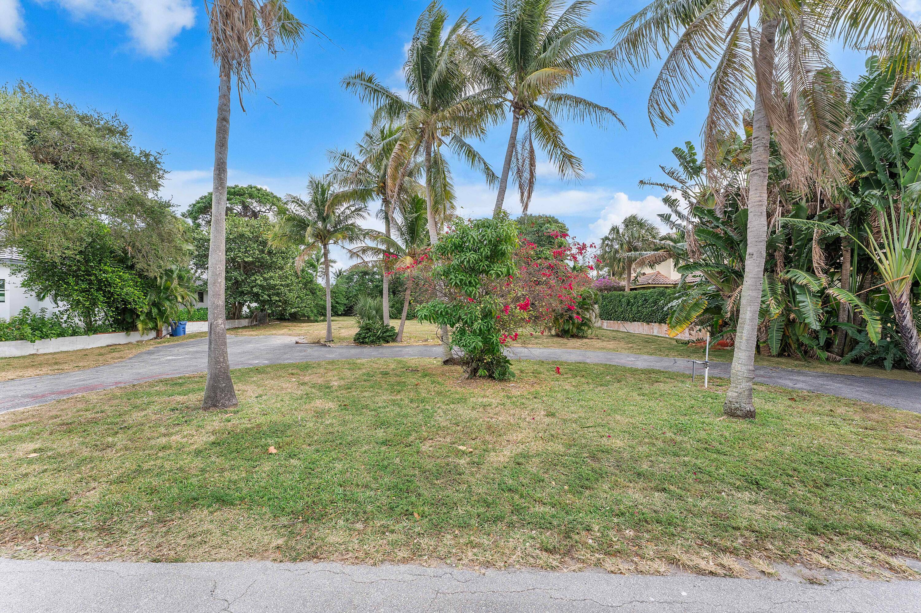 RARE OPPORTUNITY TO BUILD YOUR DREAM ESTATE ON PRESTIGOUS HYPOLUXO ISLAND, A TROPICAL SANCTUARY OF OLD WORLD MODERN ESTATE HOMES.