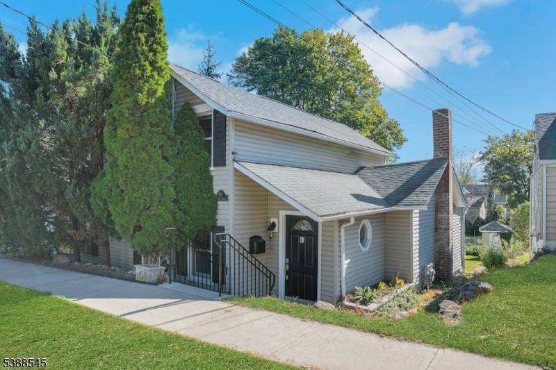 Adorable and meticulously maintained home with many updates in historical Boonton.