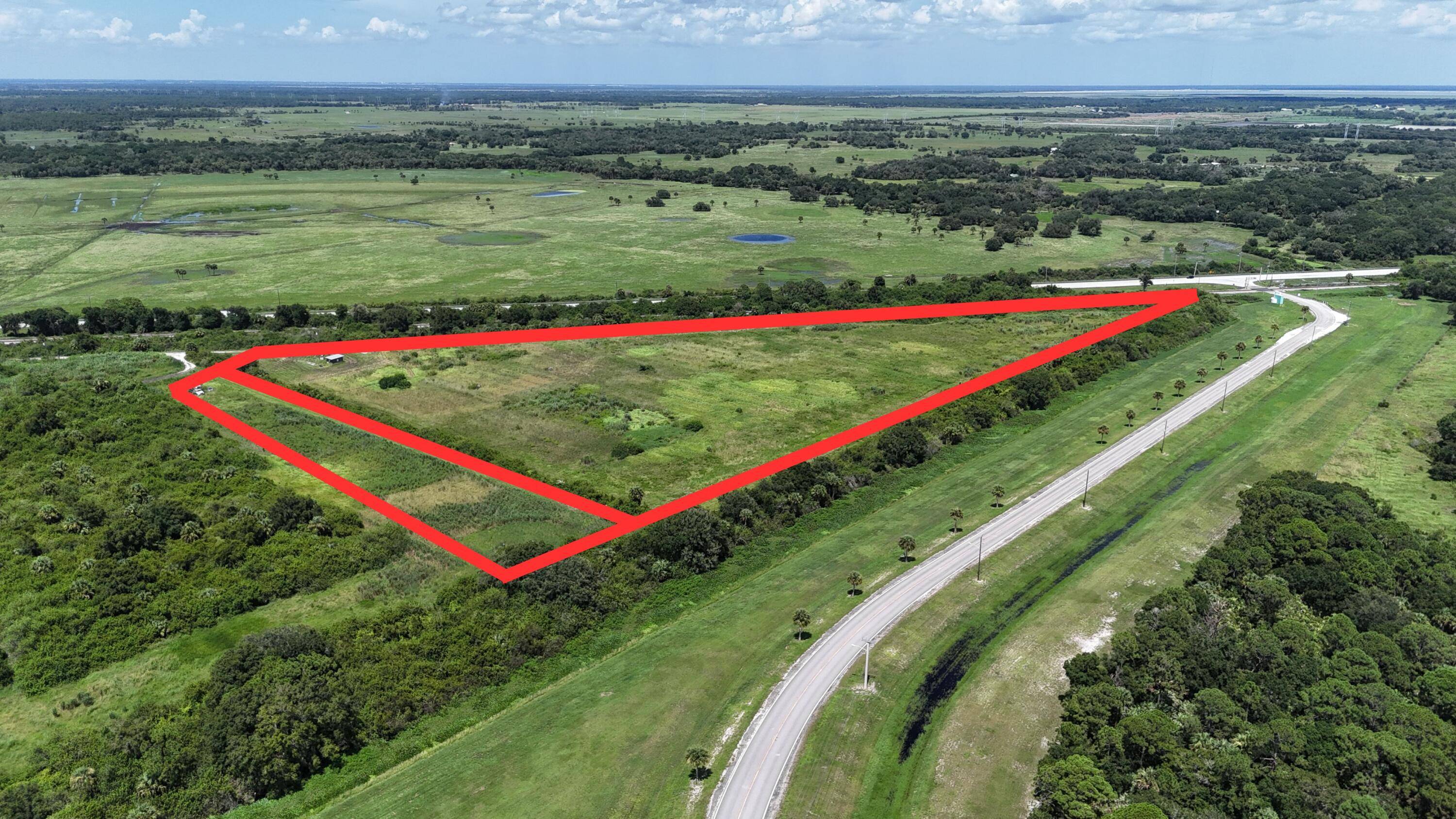 Discover the perfect canvas for your dream home, family farm, or flourishing grove on this expansive 16 acre property.