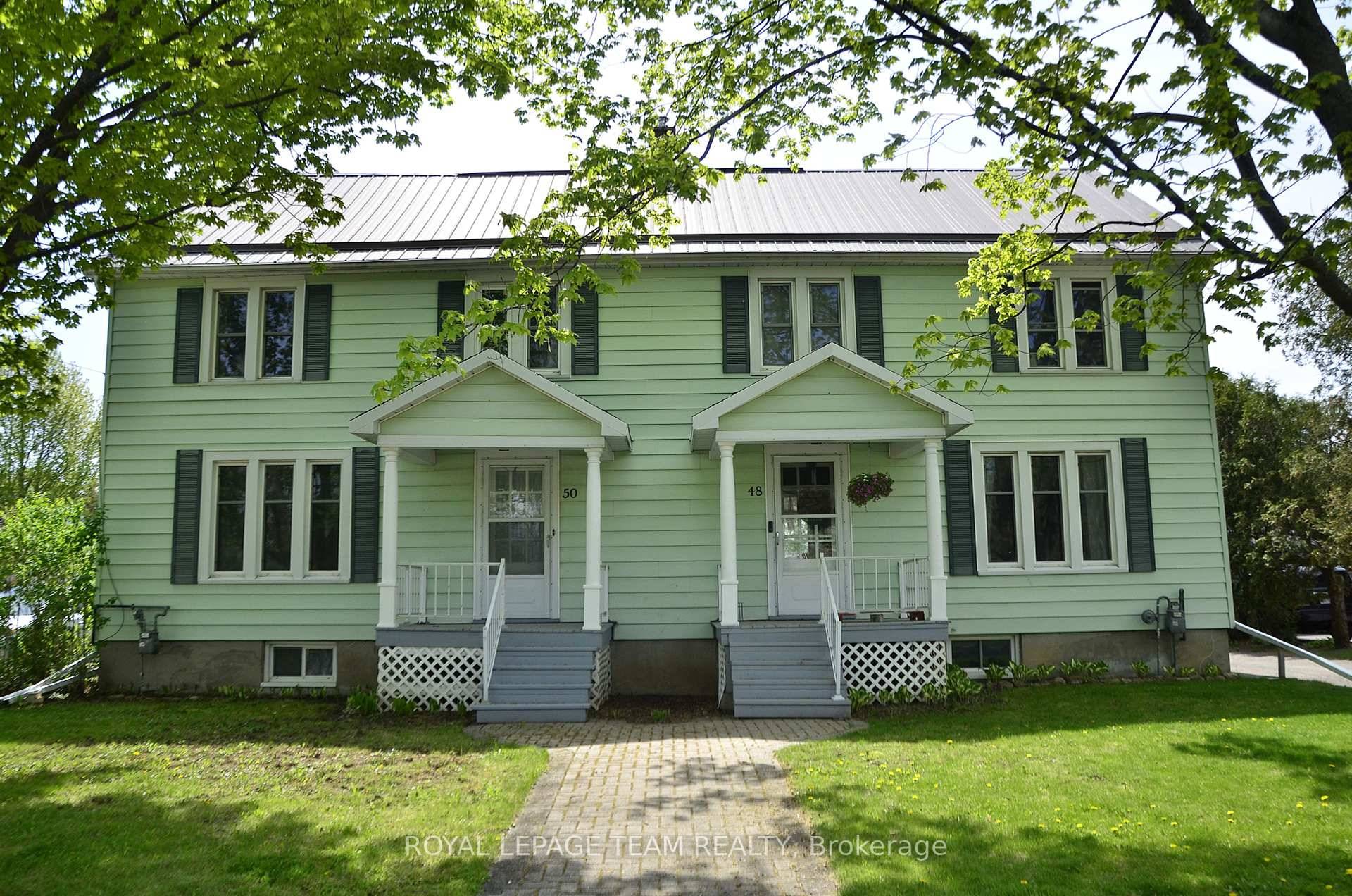 Turnkey, recently updated, well maintained duplex with lots of charm.