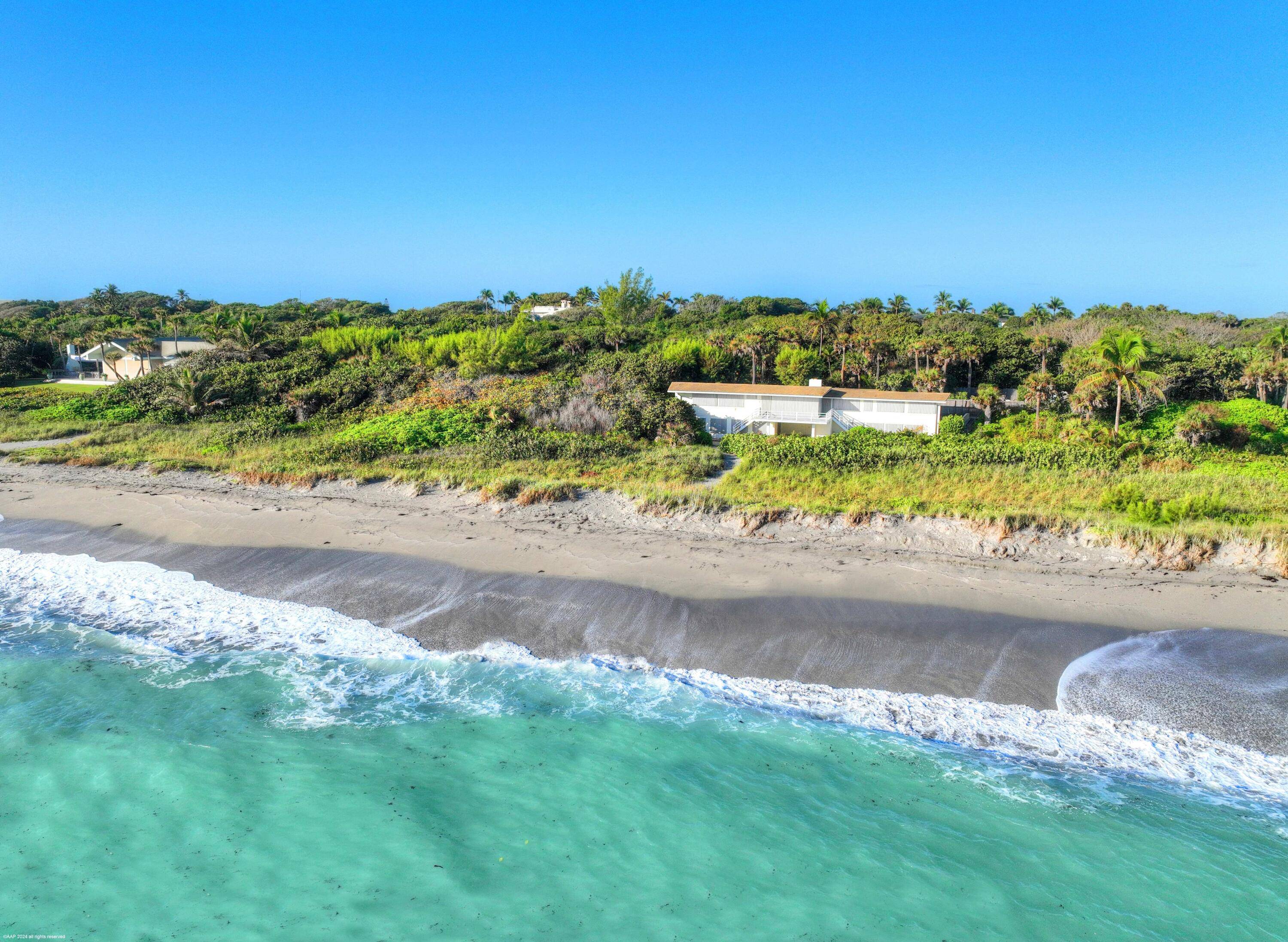 The opportunity of a lifetime to own 388' of pristine Jupiter Island oceanfront on 2.