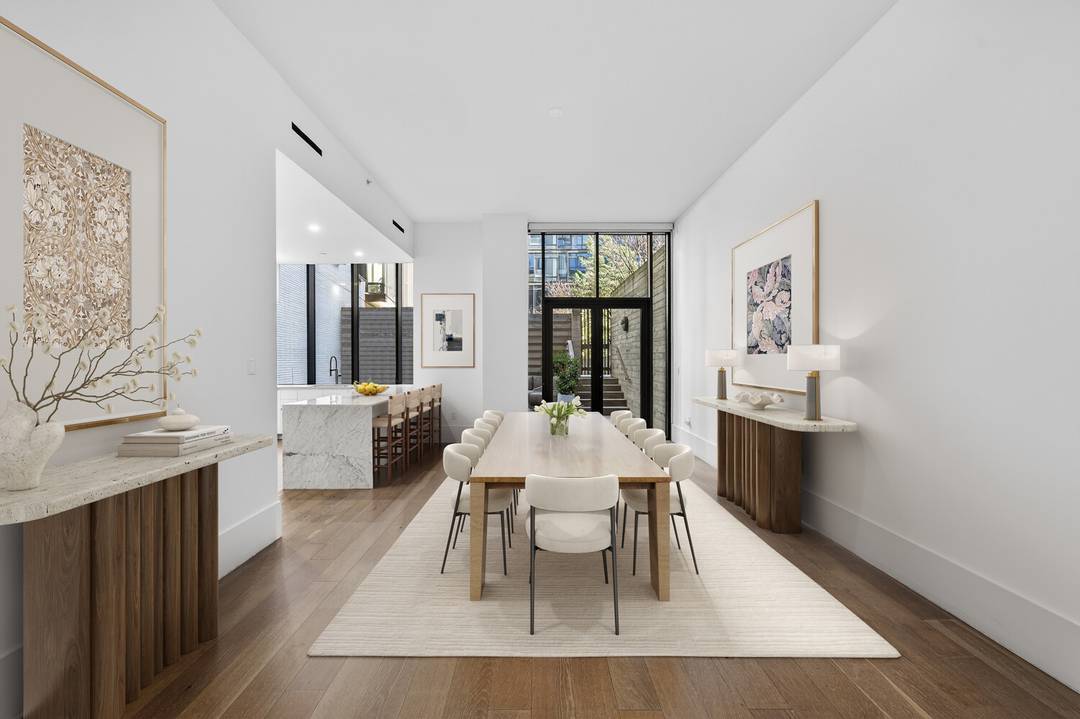 429 Kent Avenue, TH8 A striking South Williamsburg townhouse with its own private entrance and direct access 2 car garage.