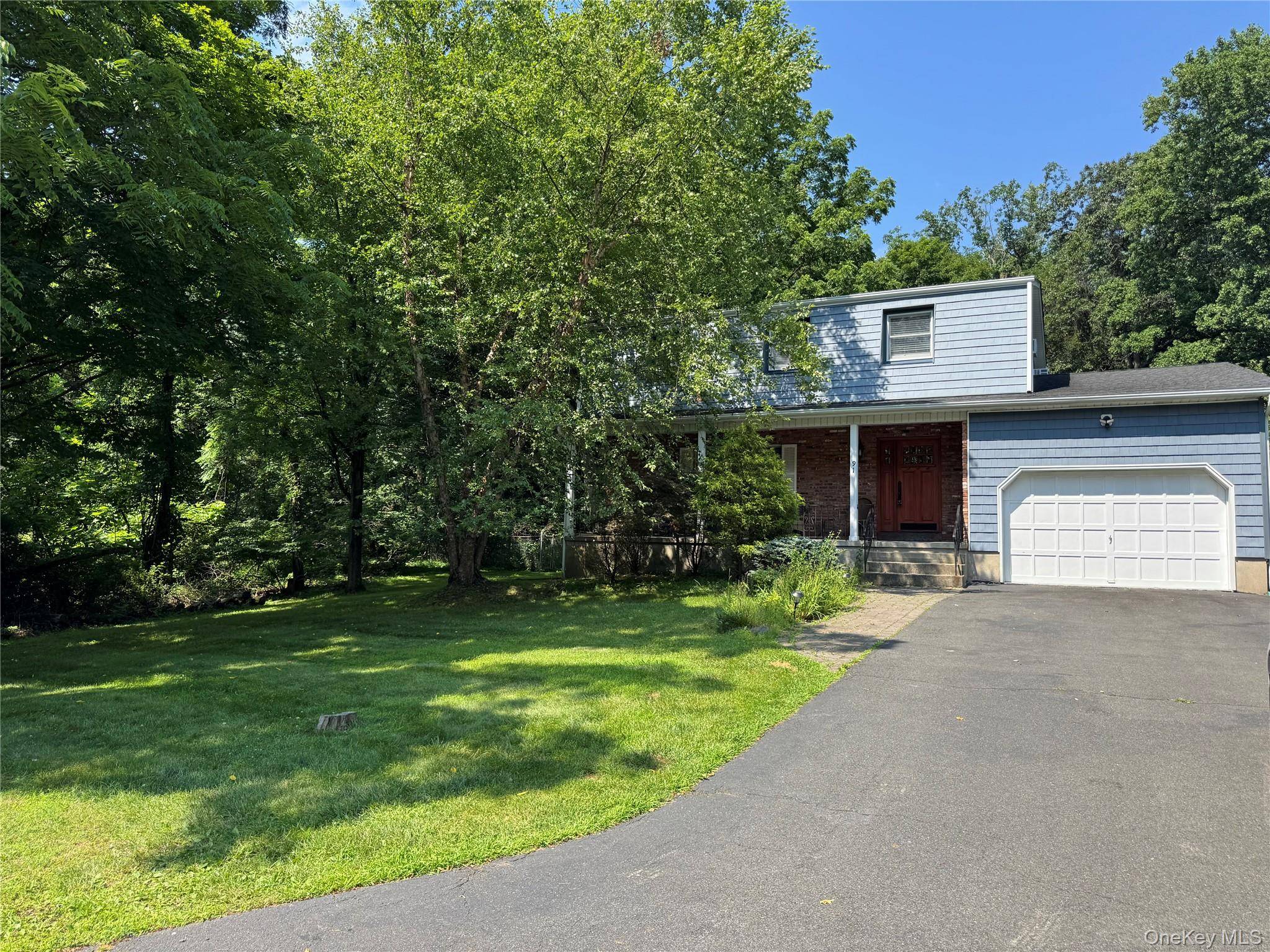 PRISTINE COLONIAL IN PIERMONT PARK LIKE SETING Welcome to this beautifully maintained 4 bedroom, 2.