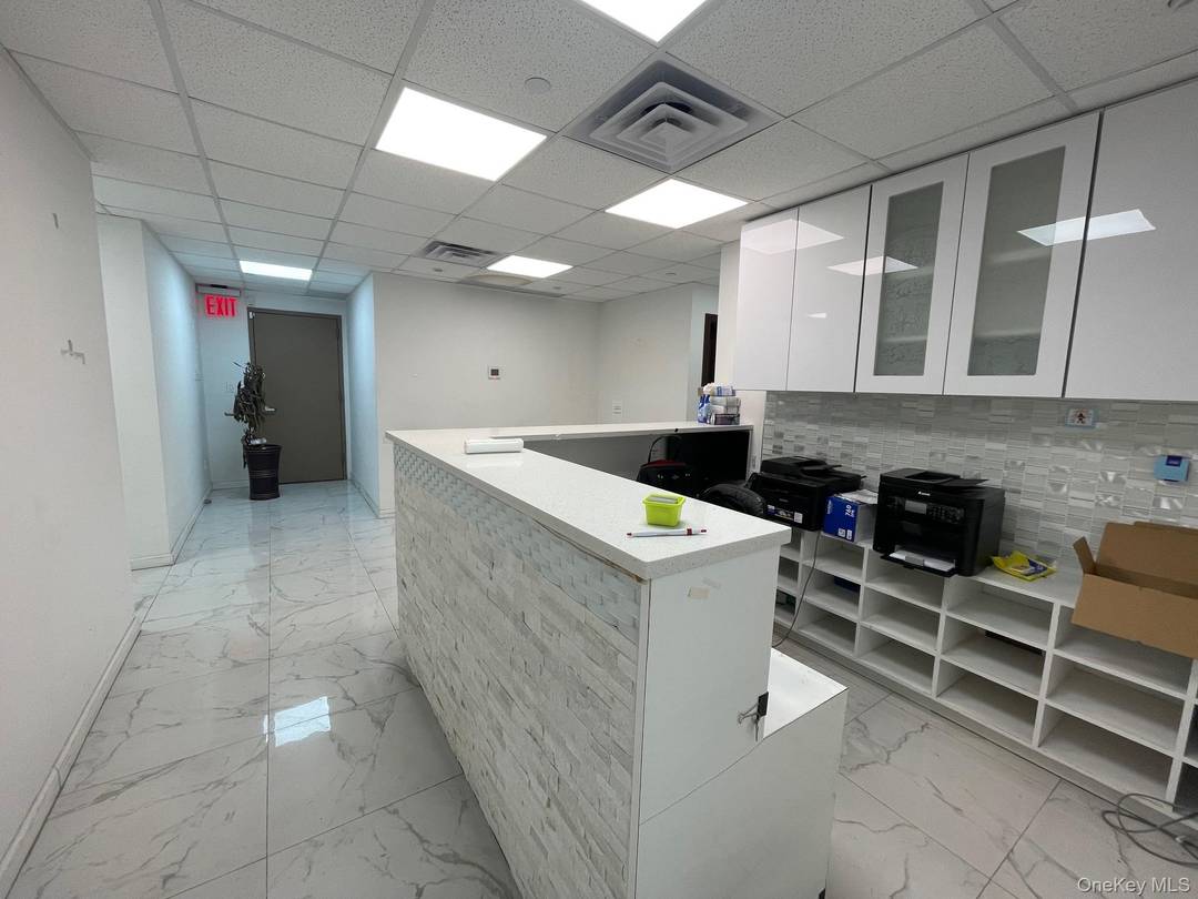 This Precious Medical Office n Downtown Flushing, NY Young Condo With ONE GARAGE PARKING SPACE For Sale On Market !