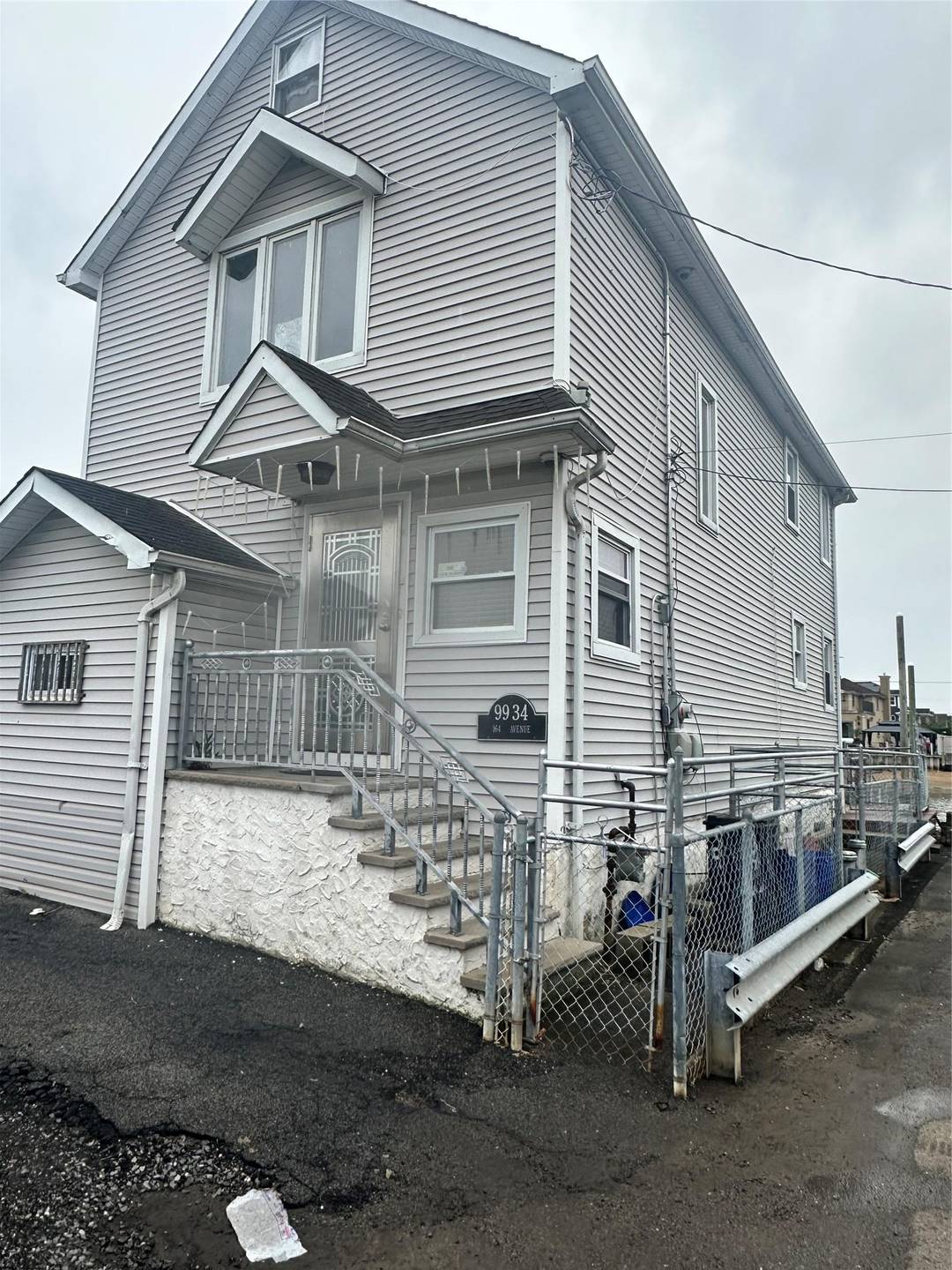 This 3 bedroom, 2 bathroom home is a waterfront property in Hamilton Beach with a stunning view of the marina.