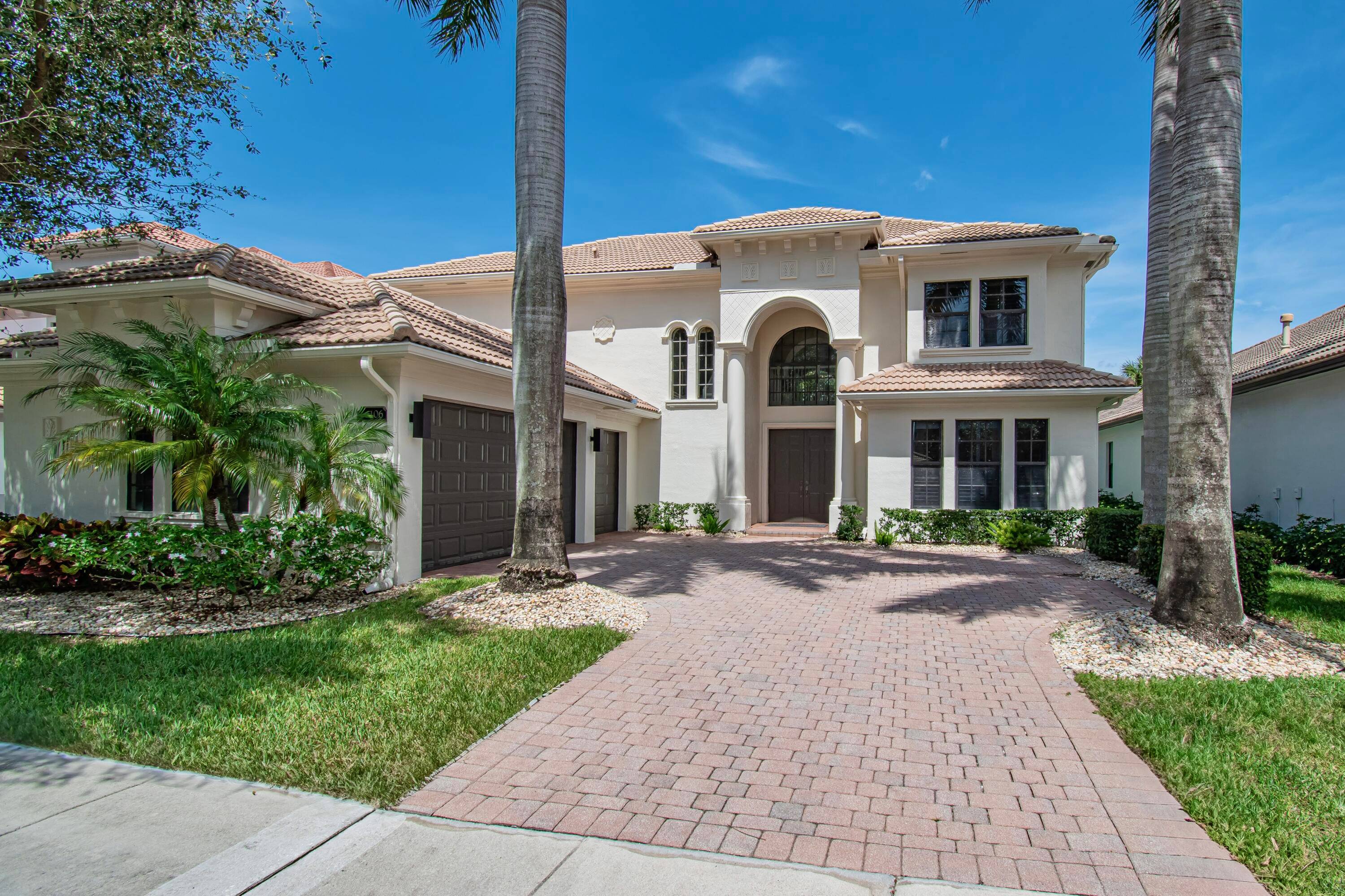 Welcome to this stunning two story estate home in the sought after community of Casa Bella in Delray Beach.
