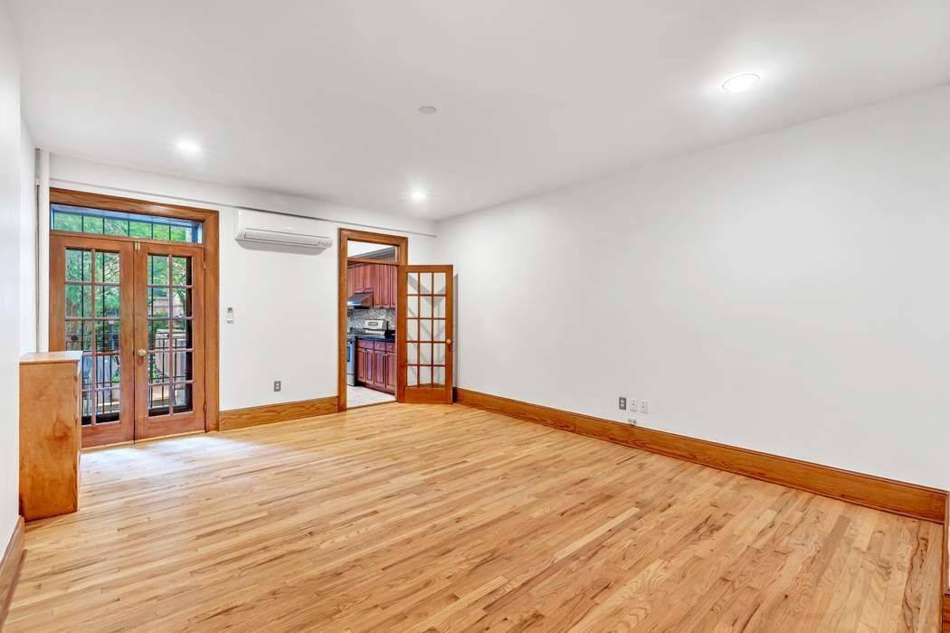 Absolutely gorgeous owner's duplex apartment with sunny private garden just moments from Central Park West.