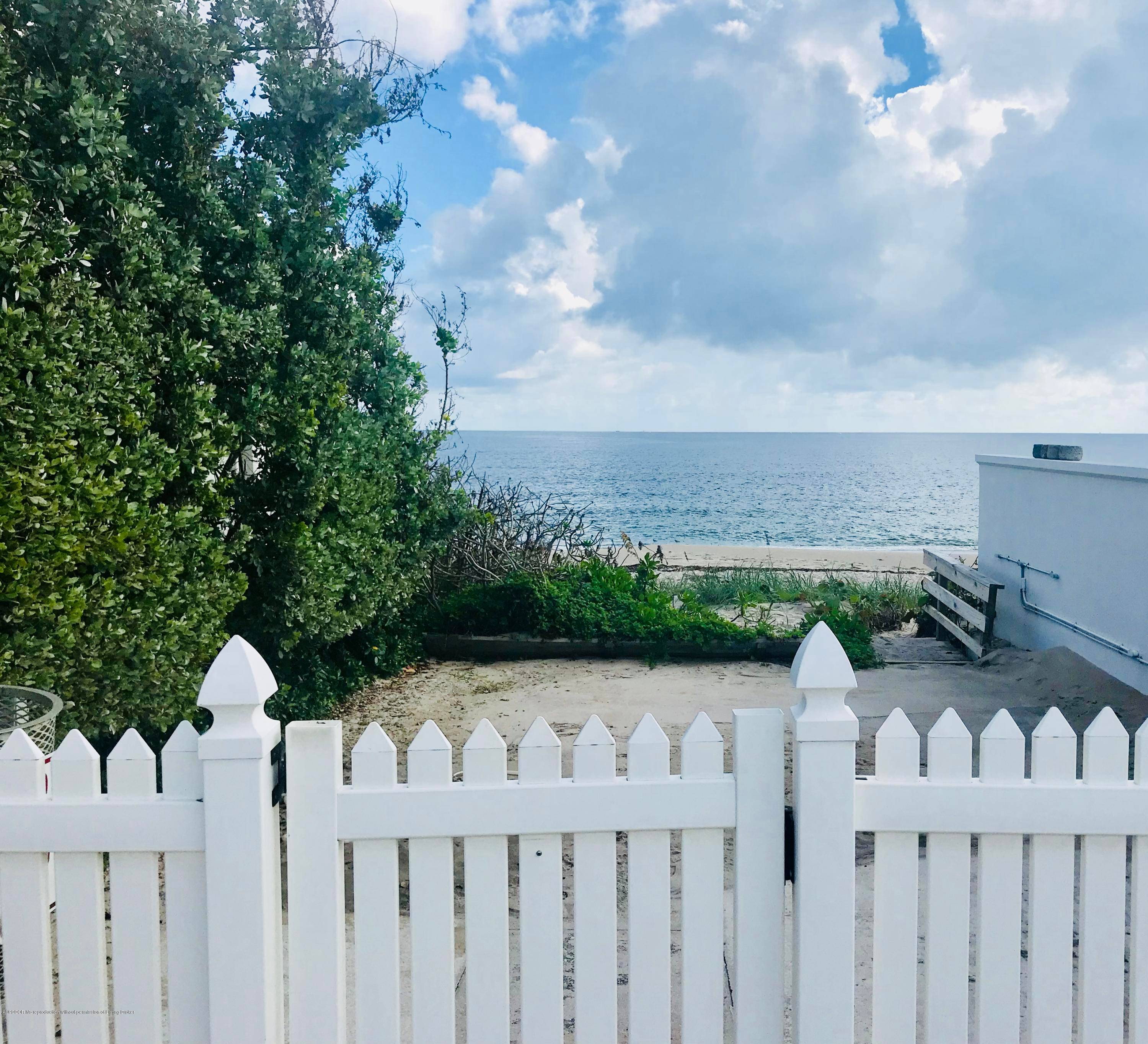Charming North End Bermuda Courtyard home centering around pool and patio.