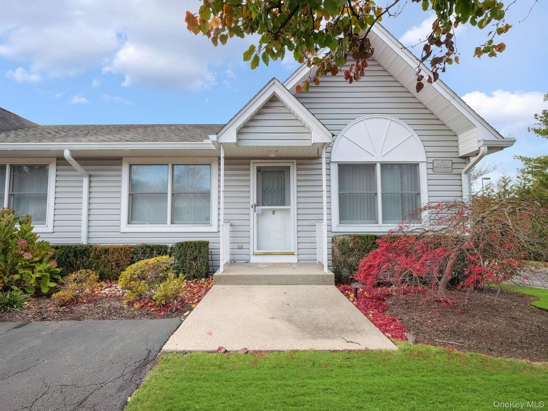 Welcome to this beautifully maintained corner unit condo located in a highly sought after 55 community.