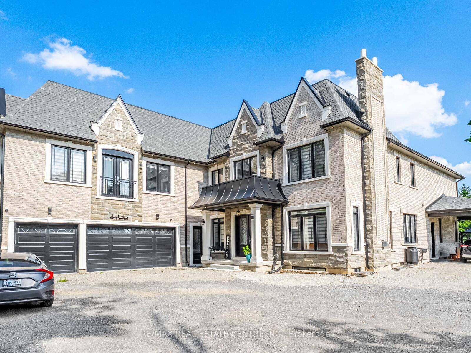 Step into luxury in this executive residence featuring a grand open concept layout and impeccable designer finishes throughout.