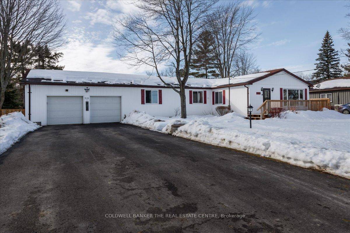 Once upon a time, nestled across the road from the serene Lake Simcoe, there stood a charming 4 bedroom bungalow.