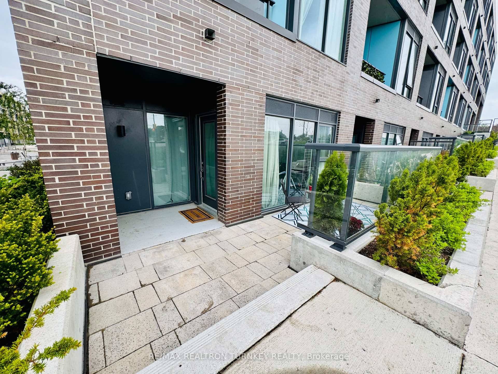Welcome to The Davis Condos, where Luxury meets Convenience in this Stunning Main Floor Corner Unit.