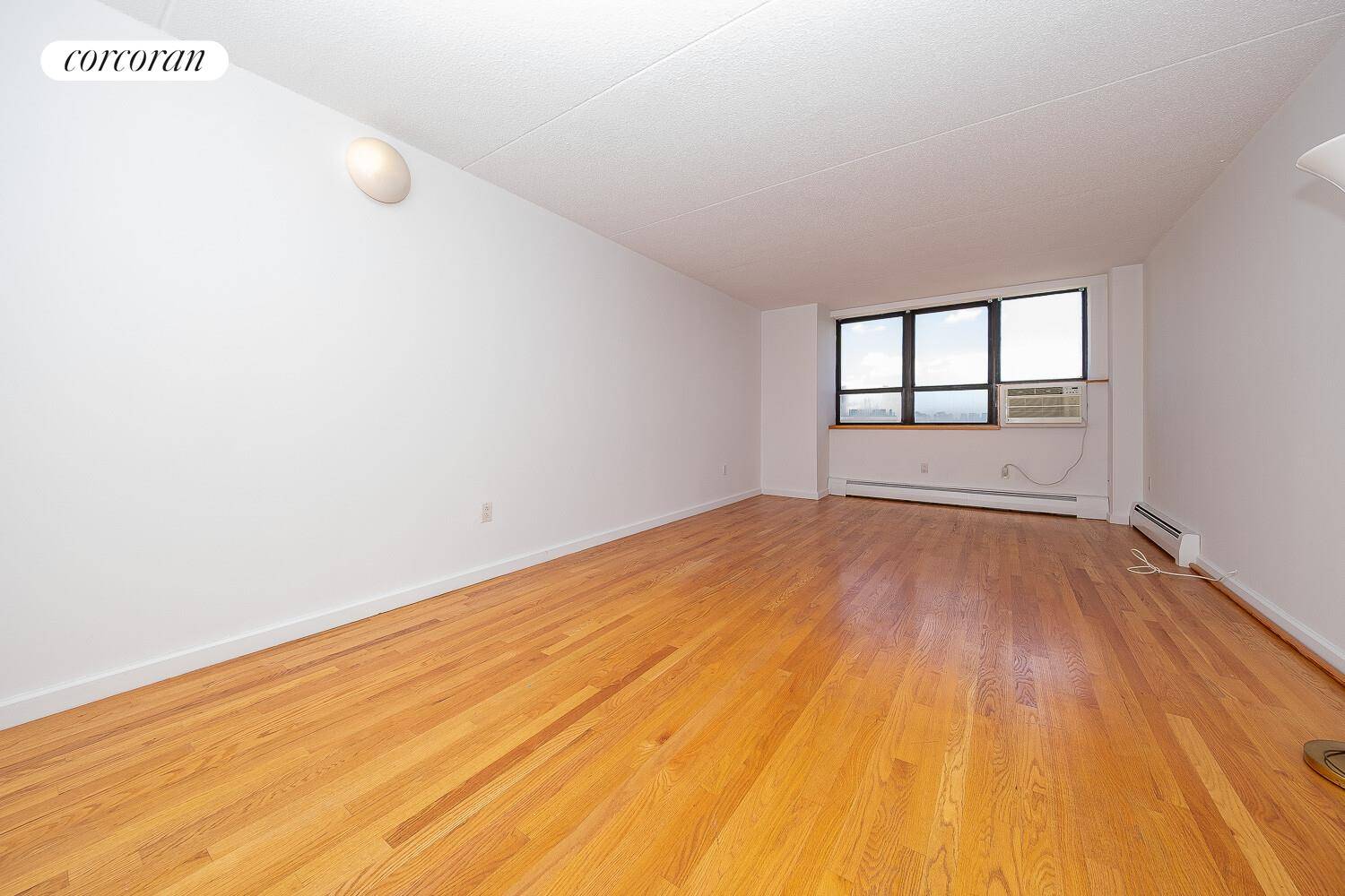 Perched above Central Park and Frederick Douglass Circle, this bright two bedroom apartment has gleaming wood floors, a large living dining room and a full kitchen just off the main ...