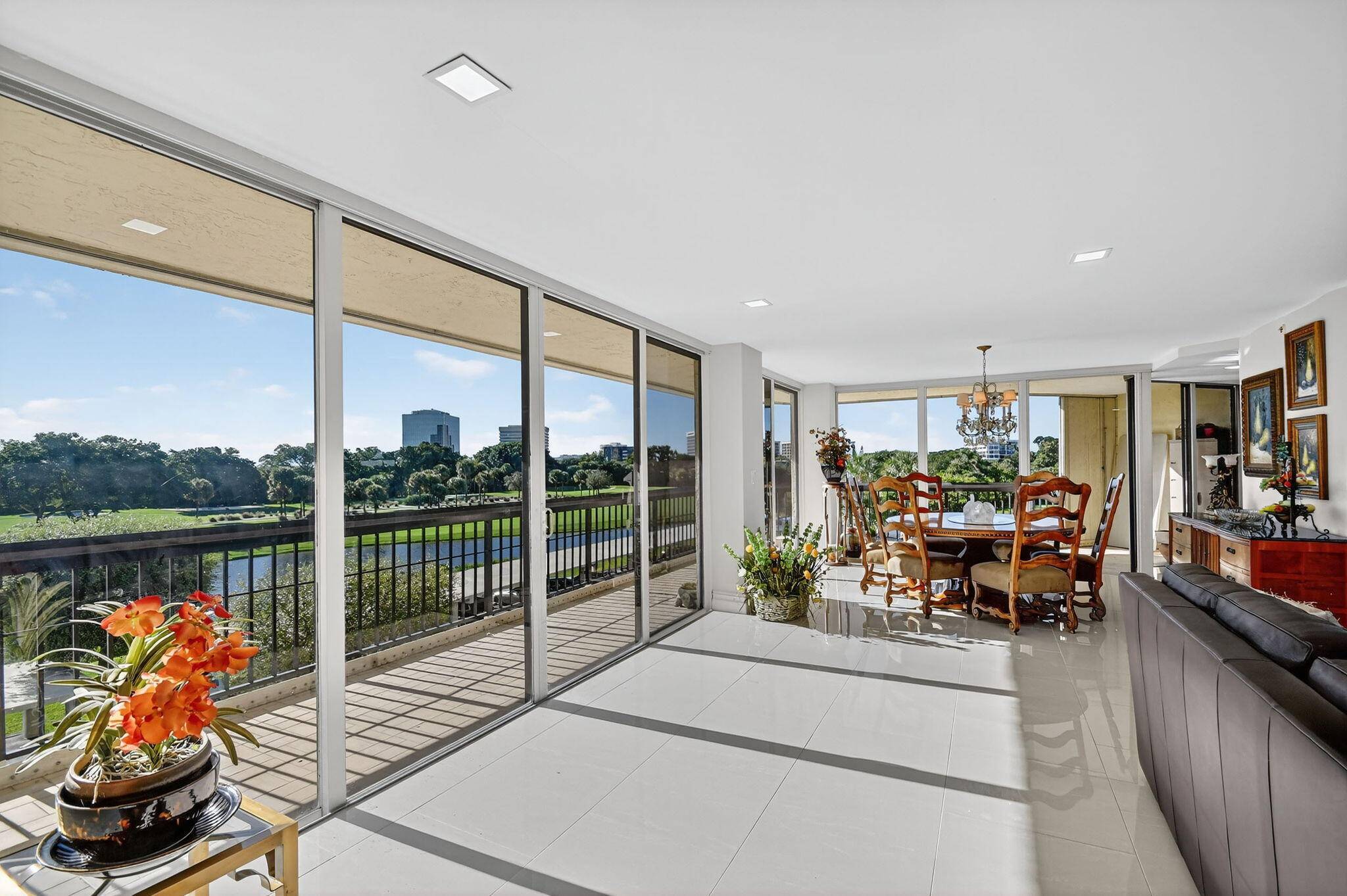 BEAUTIFULLY RENOVATED and bathed in natural light, this stunning and 3BR 2BA corner residence offers a seamless blend of space and elegance with beautiful large porcelain tile floors, wall to ...