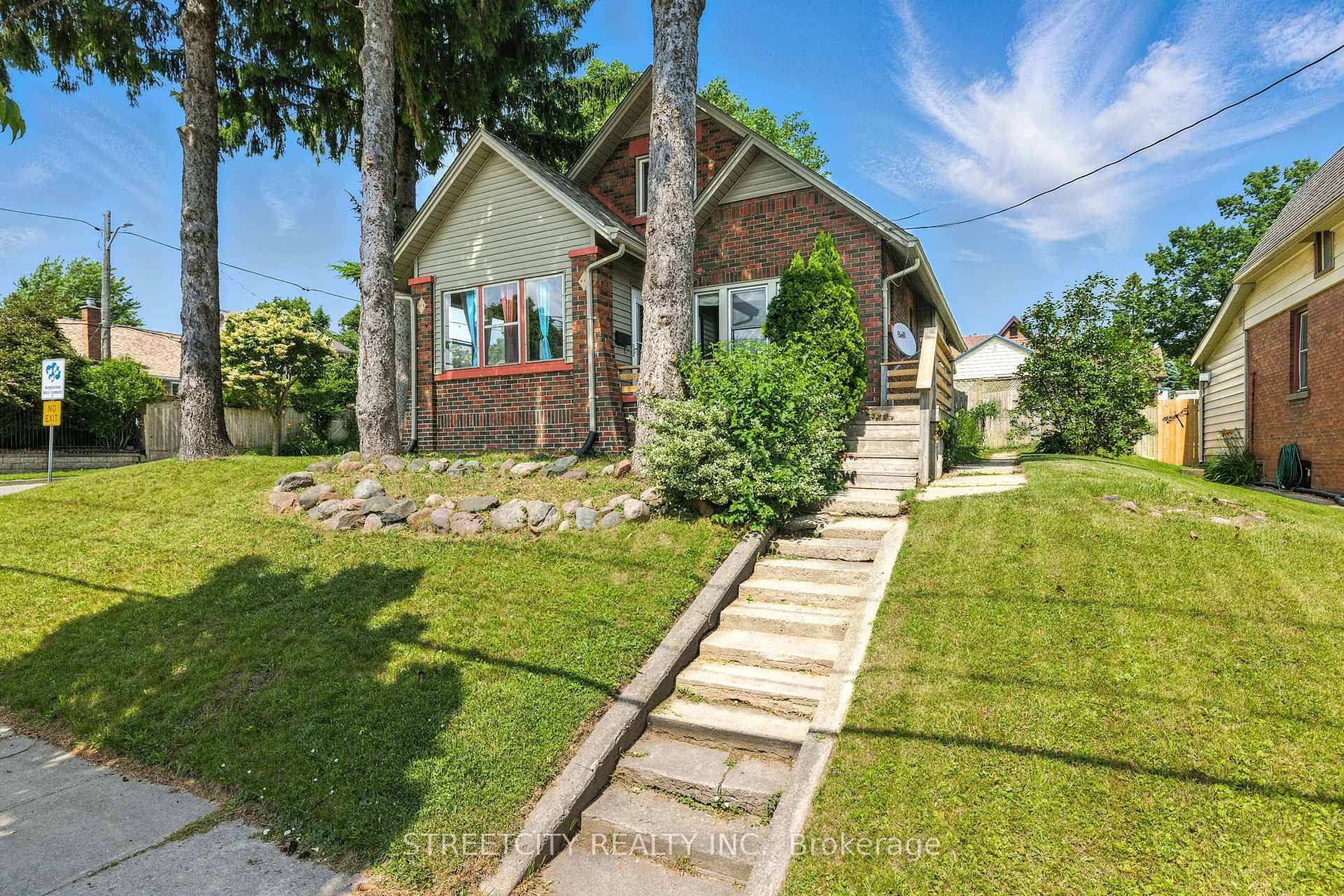Welcome to this stunning brick home perfectly situated on a desirable corner lot !