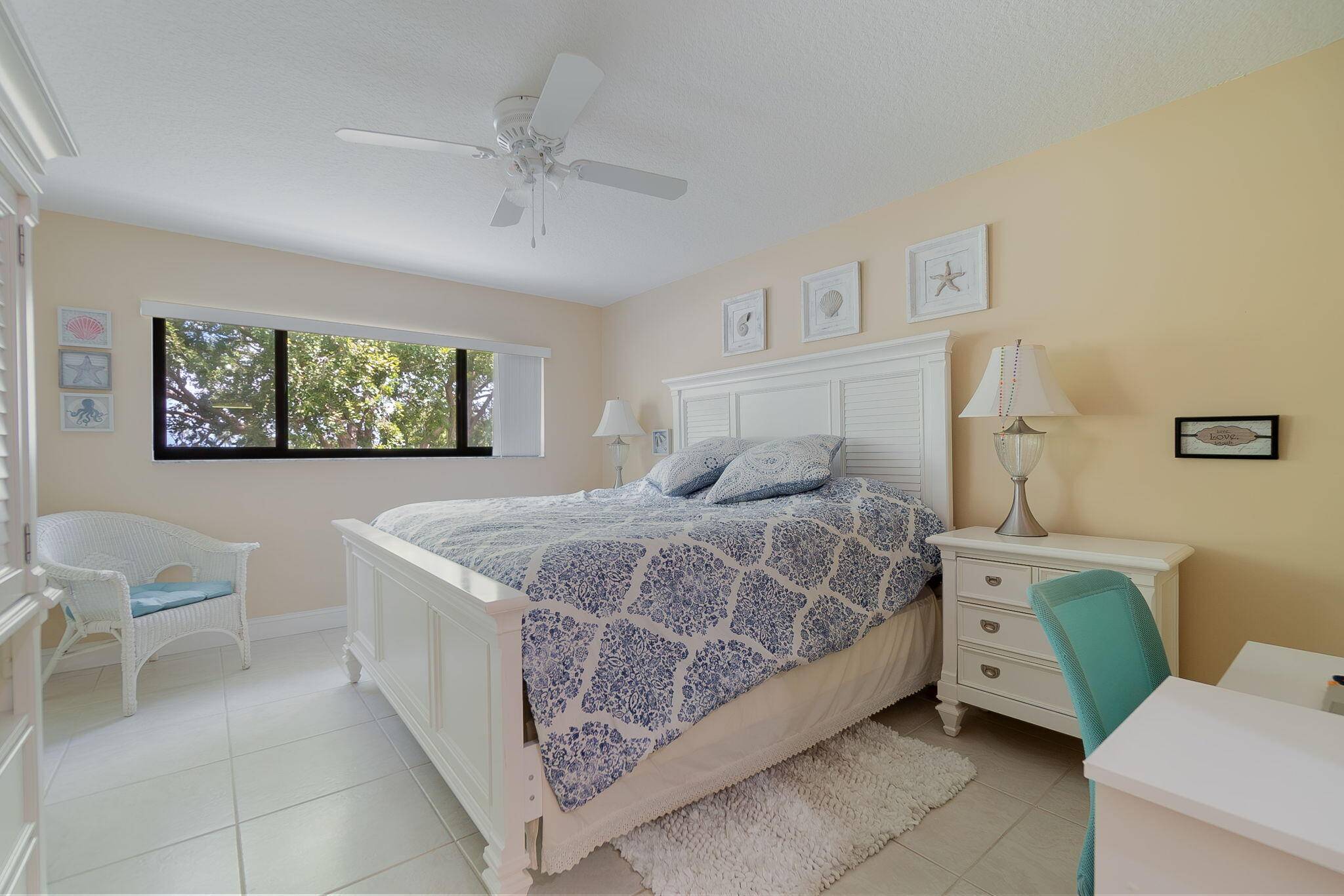 Turnkey seasonal rental, fully furnished 2BR 2BA with a tranquil canal view from the screened balcony.