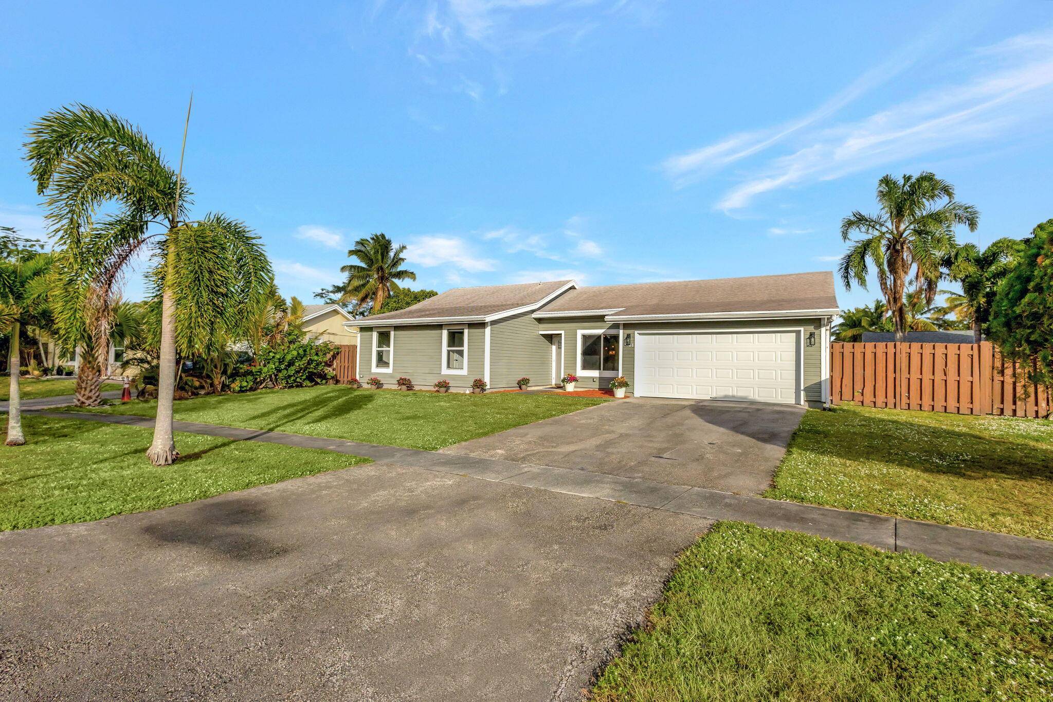 Completely move in ready 4 bedroom house with a fenced yard and 2 car garage.
