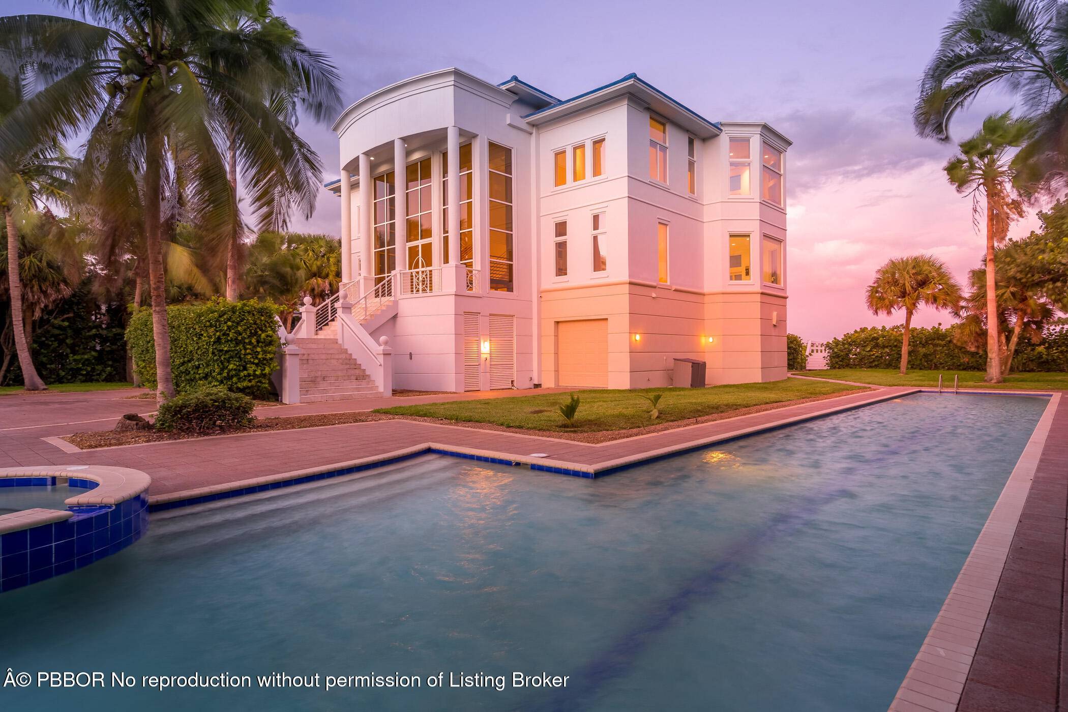 Vero Beach Estate Section of Kansas City Colony Set on nearly 2 oceanfront acres with accreting beach and private dune walkover, this gated estate offers panoramic views through walls of ...