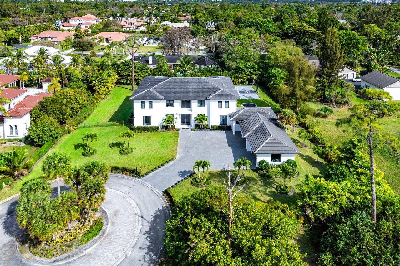 Nestled in the exclusively privately gated estate section of Parkland, this extraordinary 8, 000 sq.