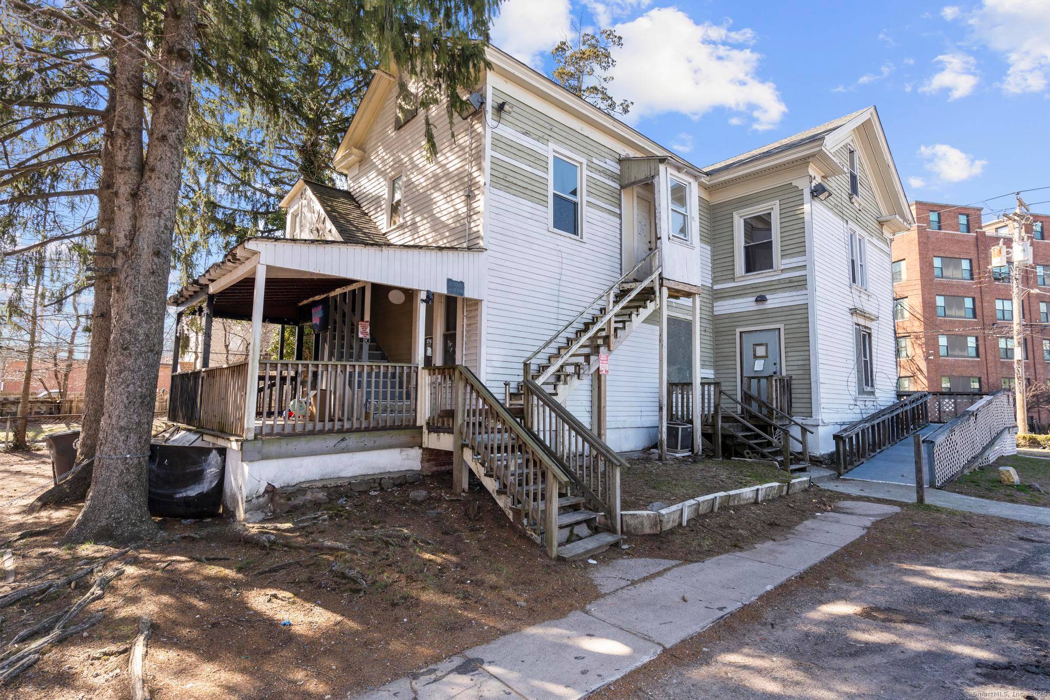 Discover 122 Derby Avenue, a classic five unit multi family in New Haven's West River neighborhood.