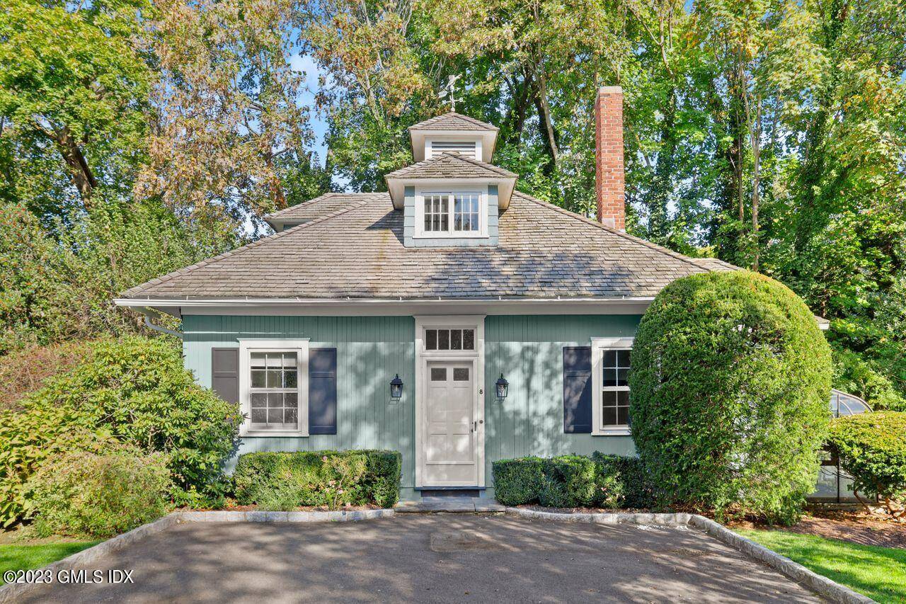Charming cottage with oversized yard south of the village in Old Greenwich.