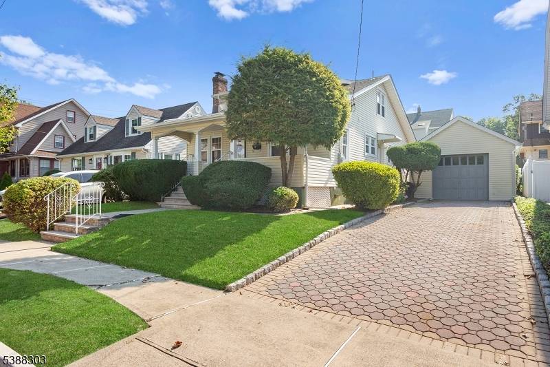 A MUST SEE Beautiful Cape Cod home located in the Manor section of Kearny.