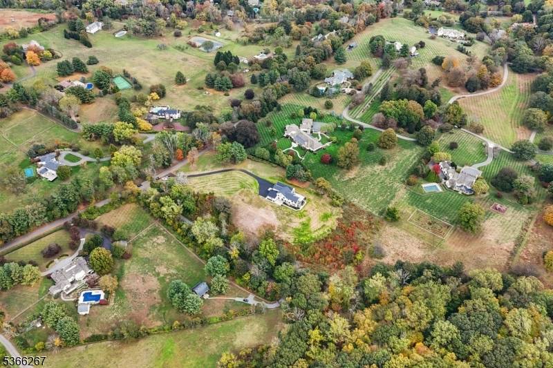 Welcome to Cherry Lane, Mendham's most prestigious address, where this brand new custom estate crowns 5.
