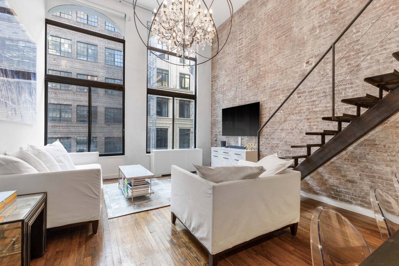 MUST BE SEEN ! This extraordinary, Mint Condition, 1 Bedroom 2 Bath Prewar Duplex Loft with 16' Ceilings and Southern City Exposures in the Cast Iron Building at 67 East ...