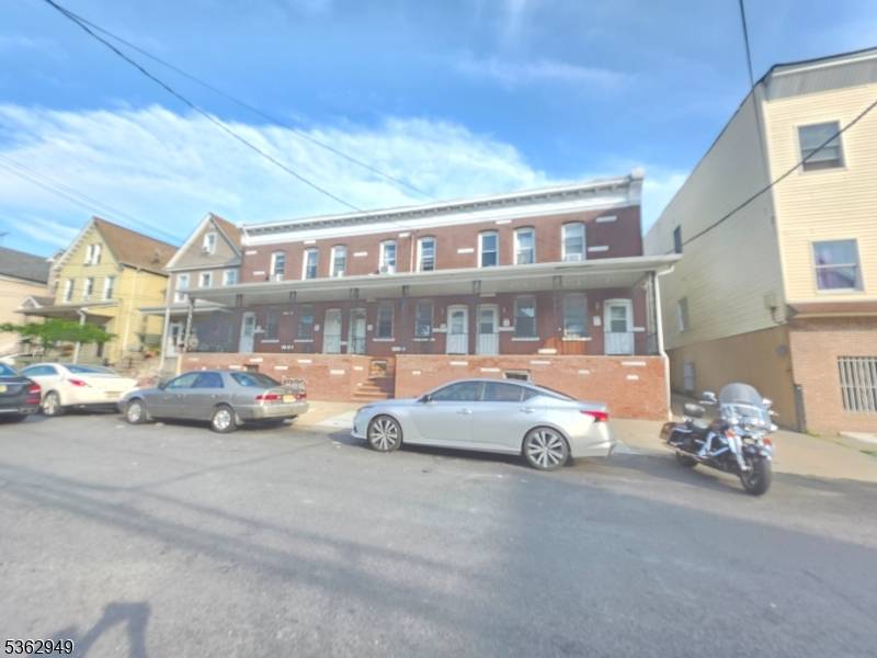 Introducing 32 Spencer Street, a prime investment opportunity in the heart of Elizabeth, NJ.