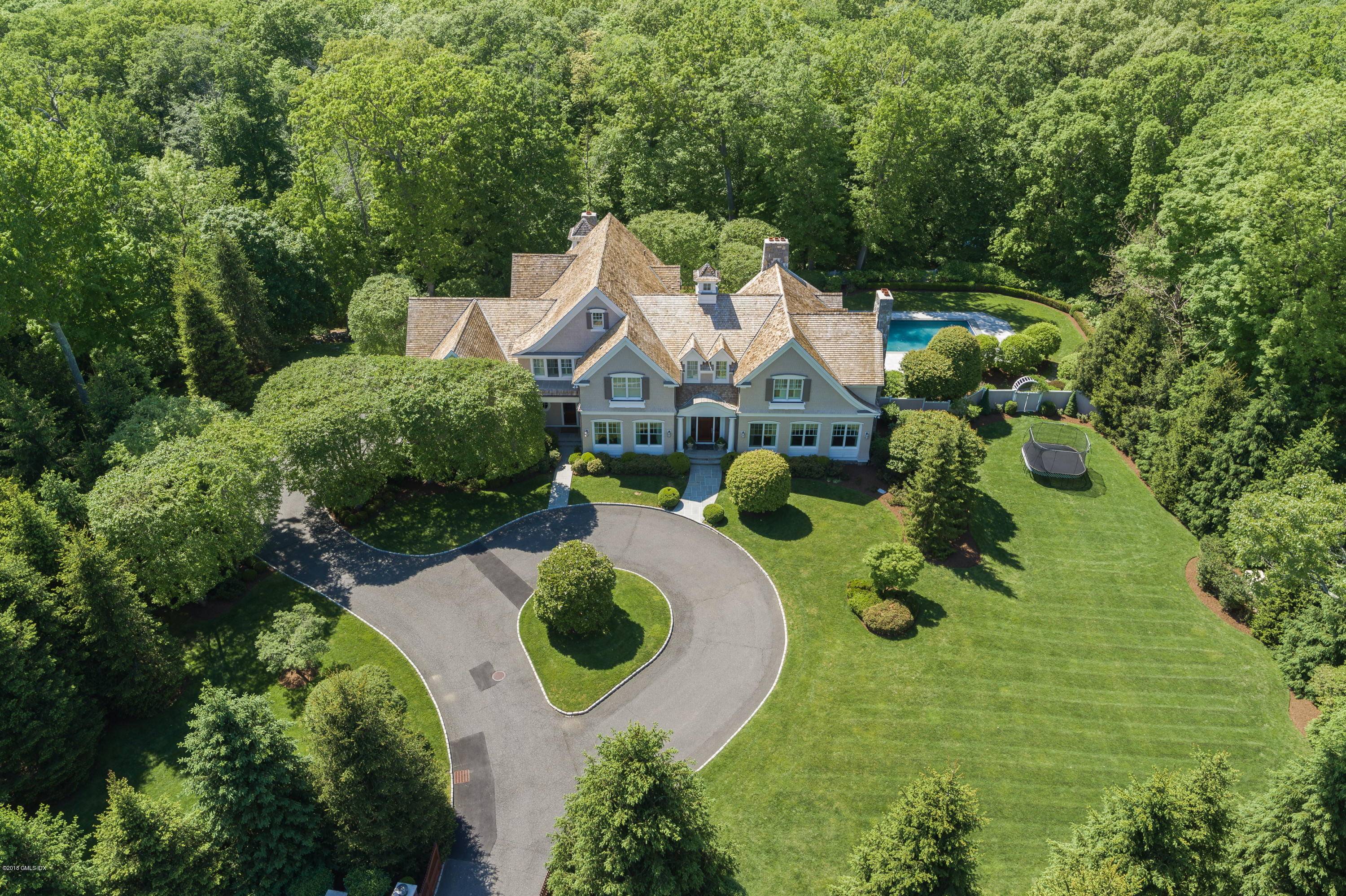 Stunning impeccable home w high ceilings flooded w sunlight.