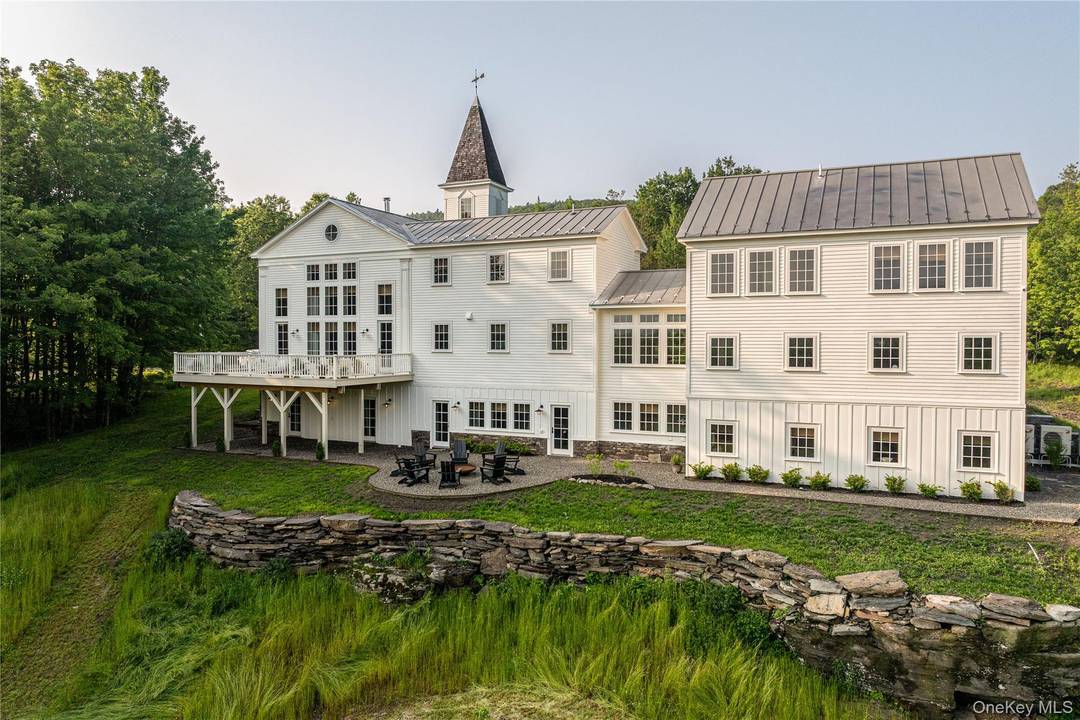 Welcome to Potter Mountain House, a masterfully reimagined Greek Revival church turned luxury designer estate.