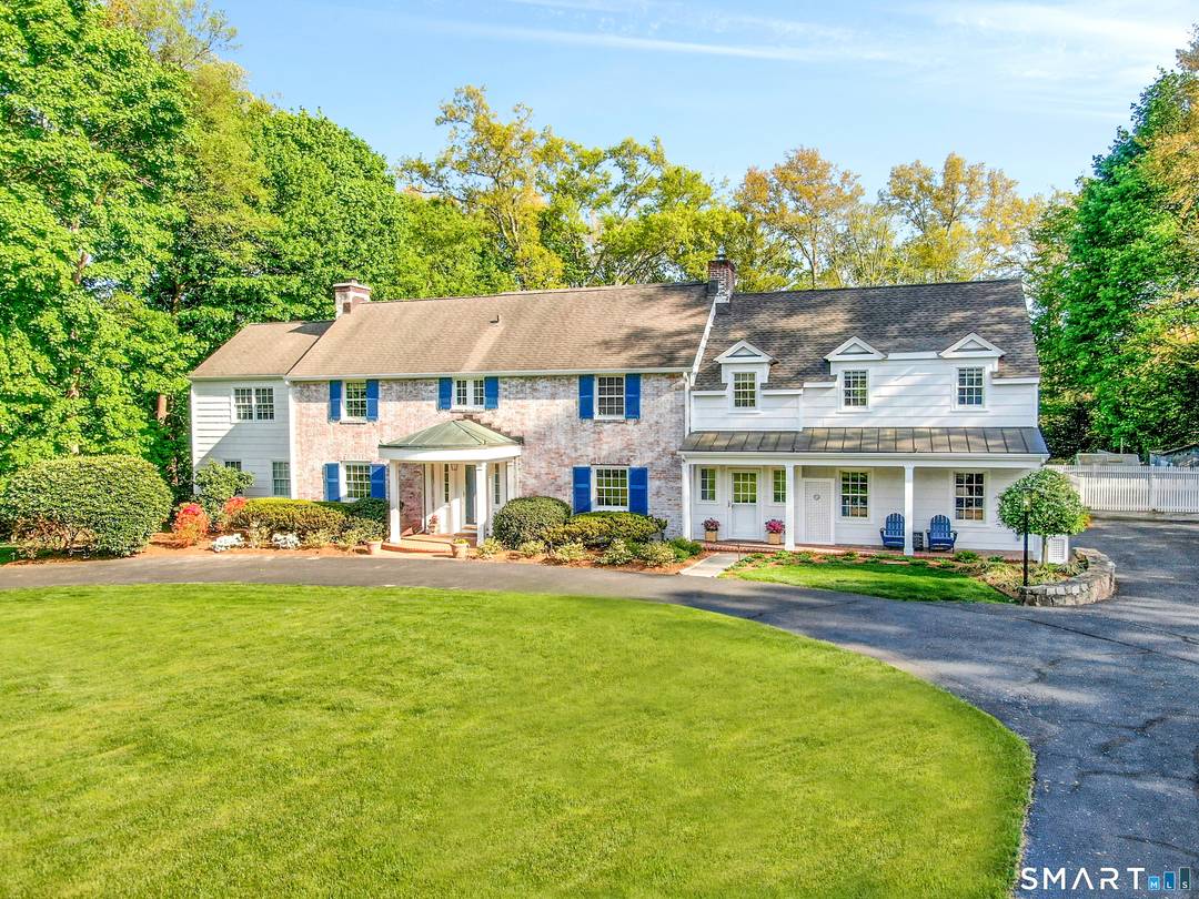 This charming and updated colonial home, steeped in gracious style and beautiful natural light, is a great place for entertaining.