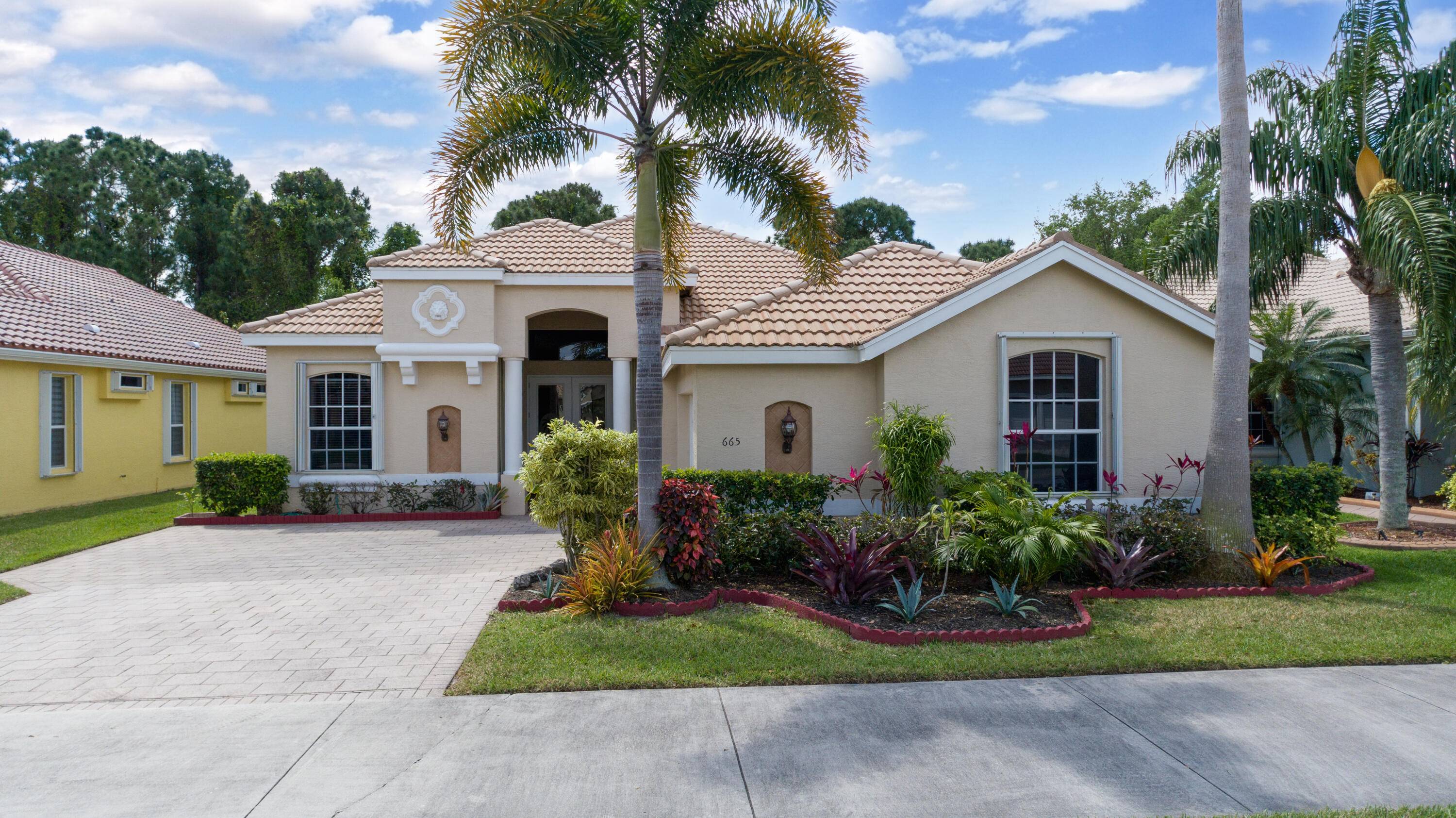 This gorgeous property is located in the desirable gated community of Lake Charles in Port St Lucie.