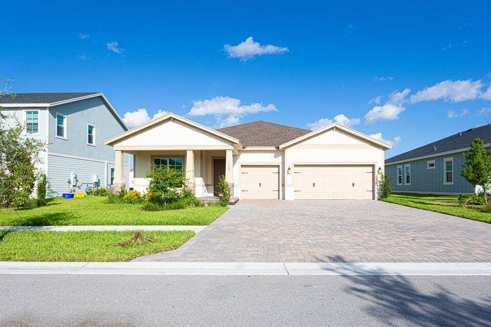 Located in Arden, a brand new community developed by Lennar, this beautiful home offers modern living in the heart of Palm Beach County.