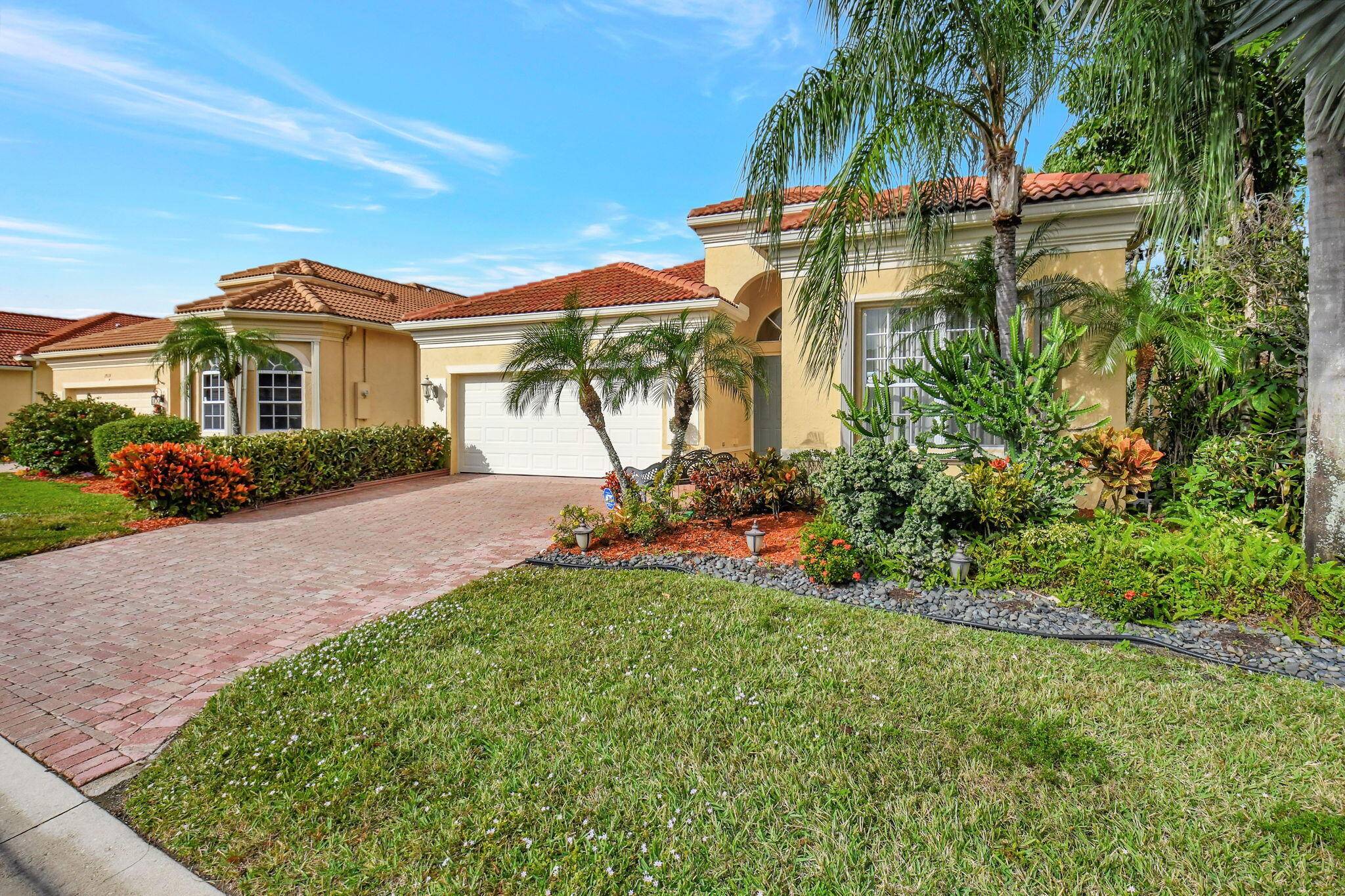 Stunning lakefront home on one of with best lots in Vizcaya with beautiful lake views.