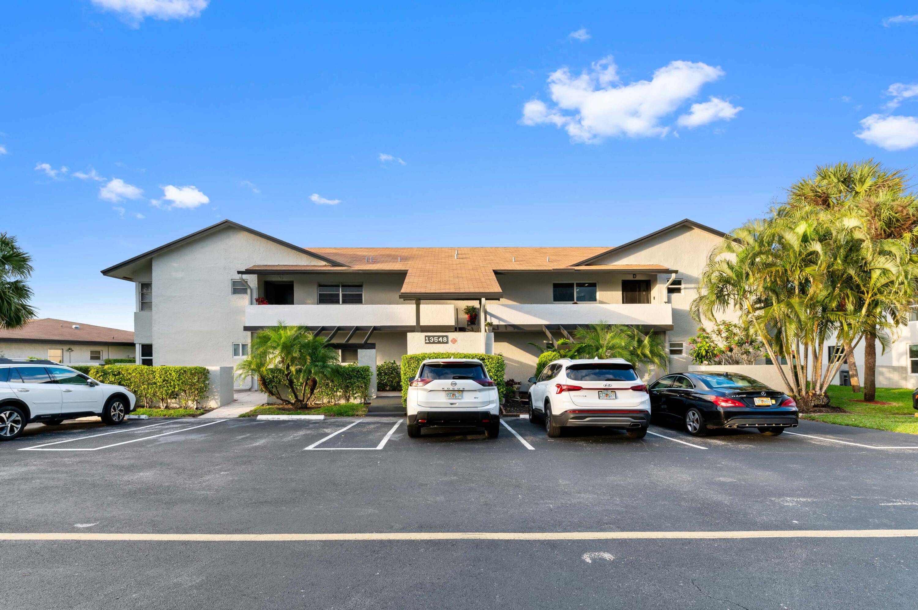 Introducing an attentive and expansive first floor corner condominium located in the sought after Palm Greens active adult community at 13548 Sabal Palm Court, Delray Beach, FL.