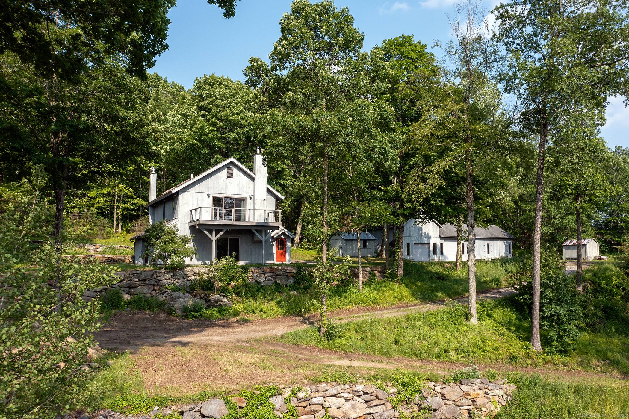 Incredible opportunity in Kent featuring breathtaking westerly views and over 50 acres of land.