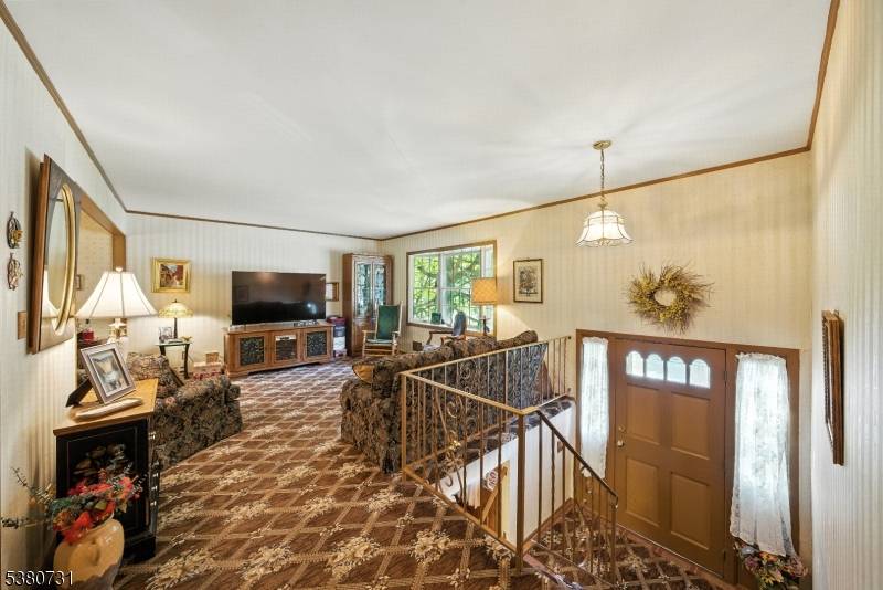 Welcome to this well maintained home in a sought after neighborhood, offering a spacious yard, a two car garage, and a double wide driveway perfect for guests or extra parking.