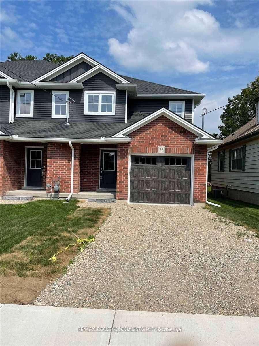 Welcome to a charming town home on 73 Park Row with a cozy cottage feel and a huge private fenced backyard w deck.